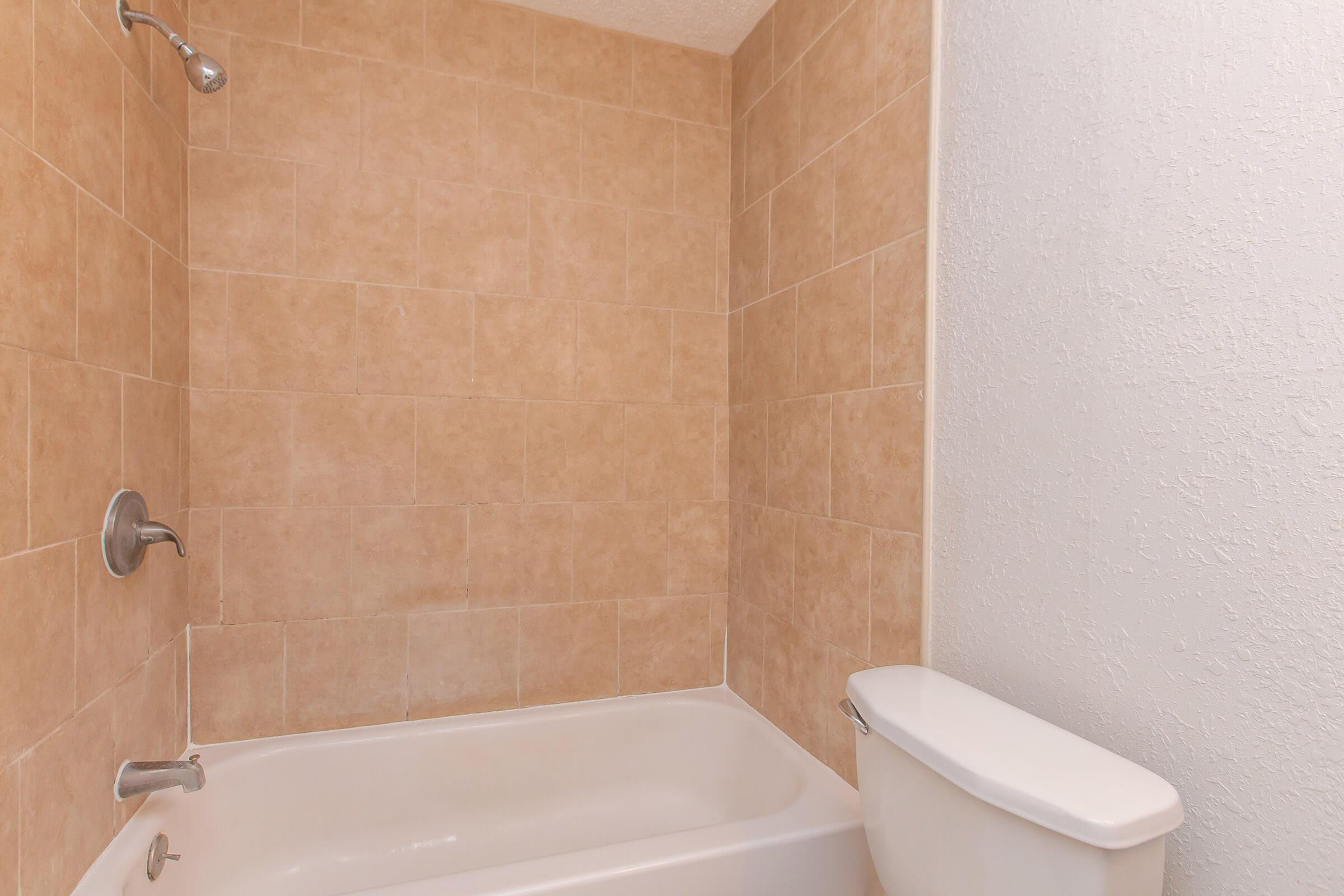 a room with a sink and a bath tub