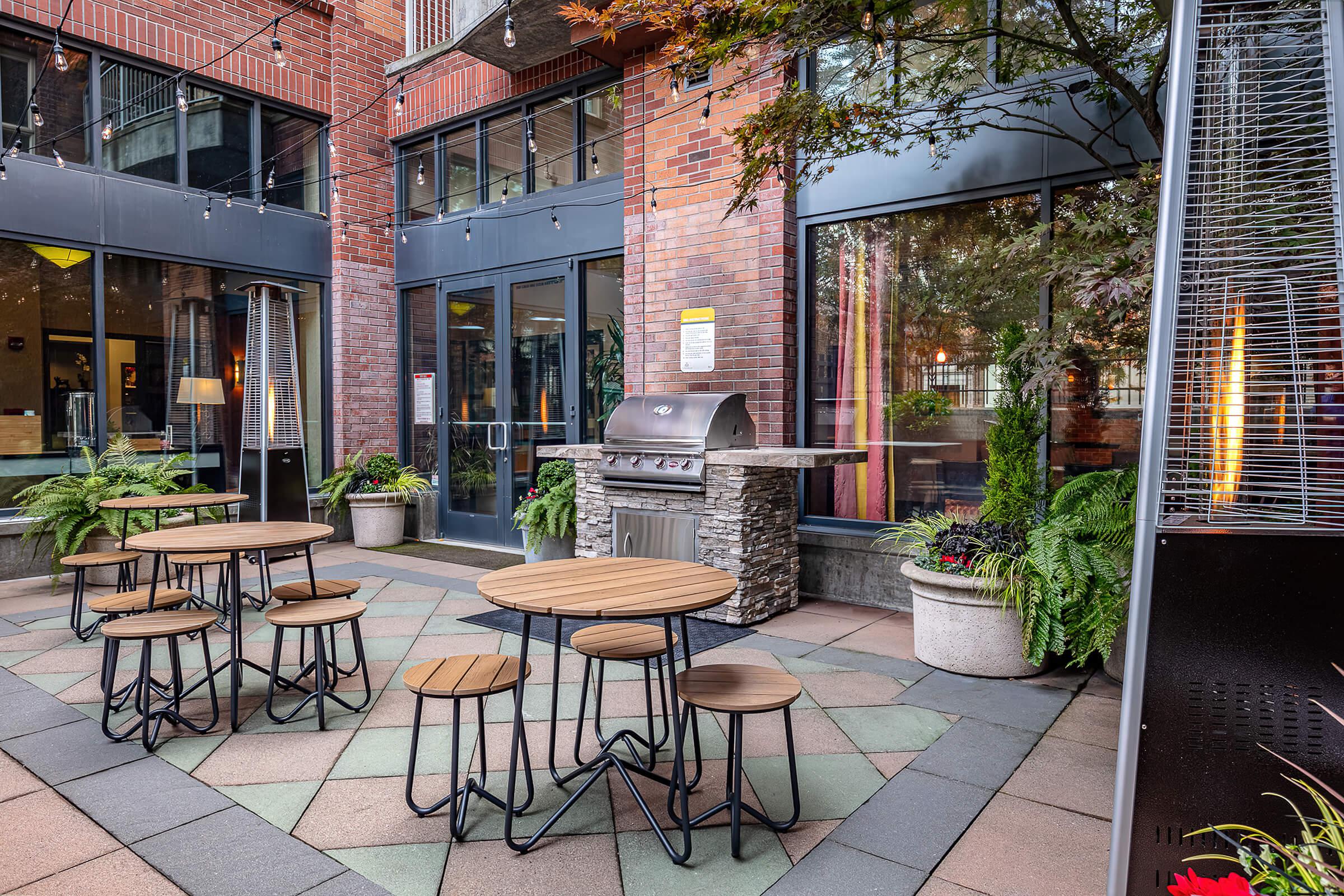 a chair sitting in front of a brick building