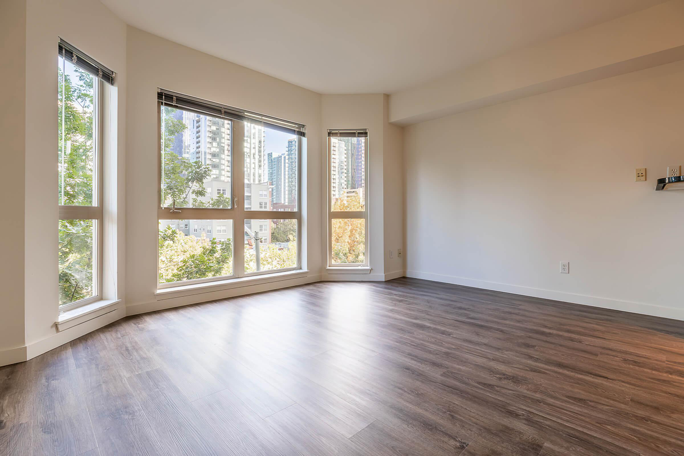 a room filled with furniture and a large window