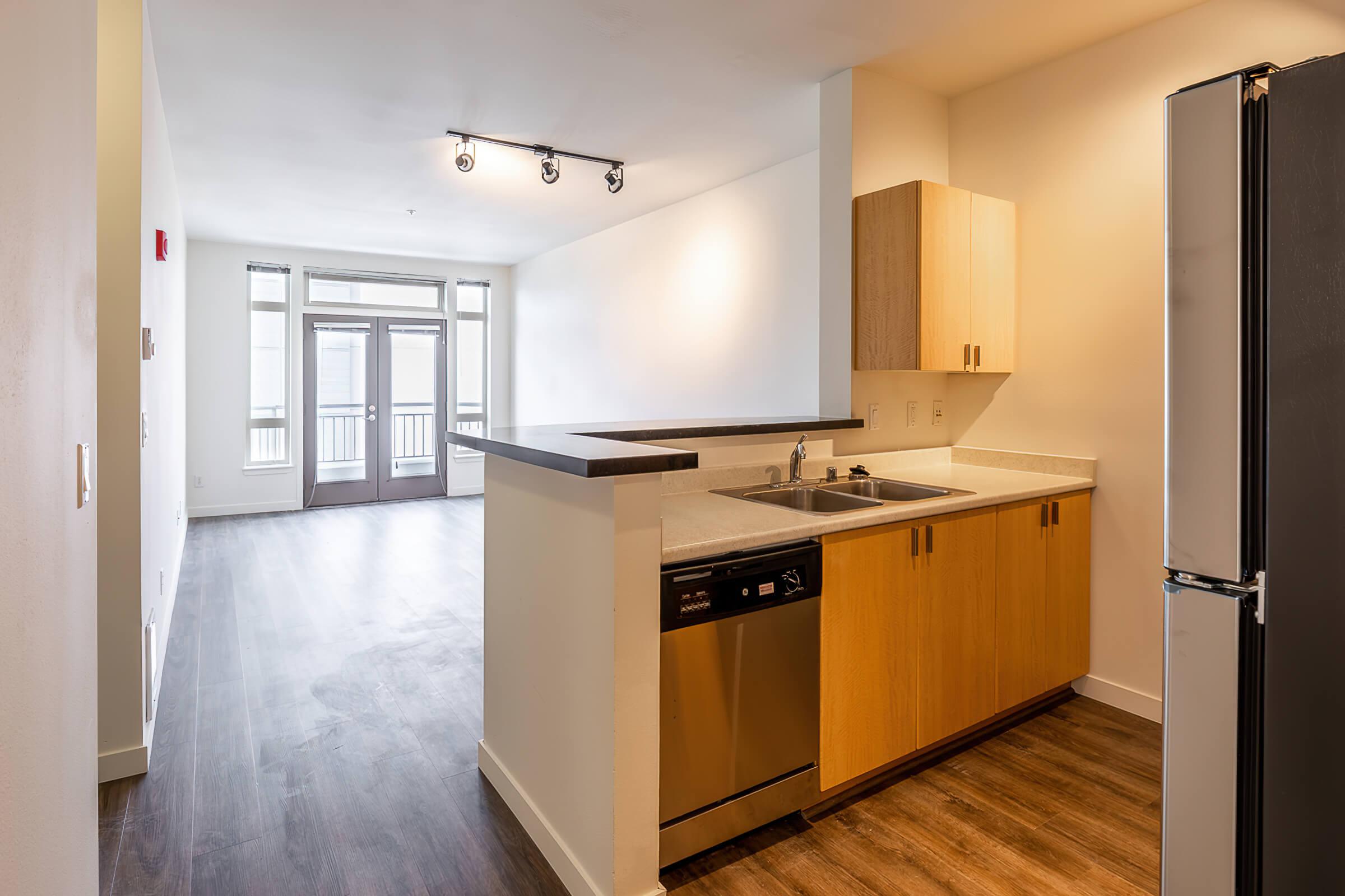 a stainless steel refrigerator in a kitchen