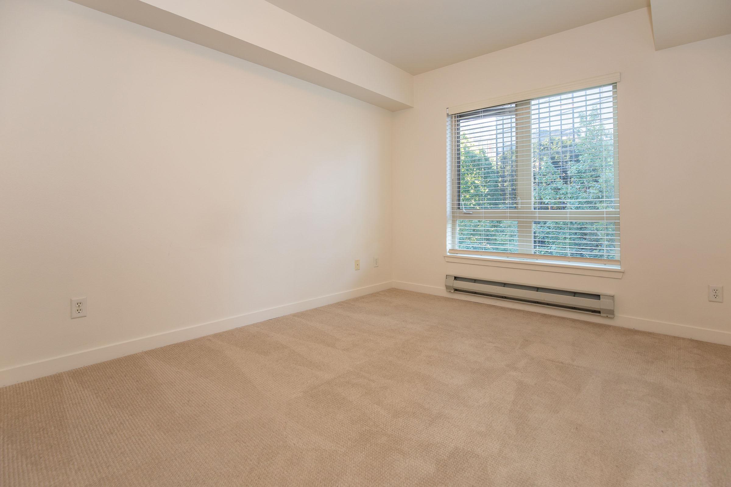 a living room next to a window