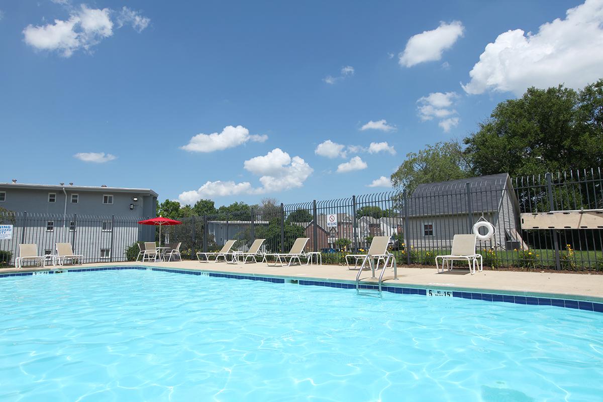 a pool next to a body of water