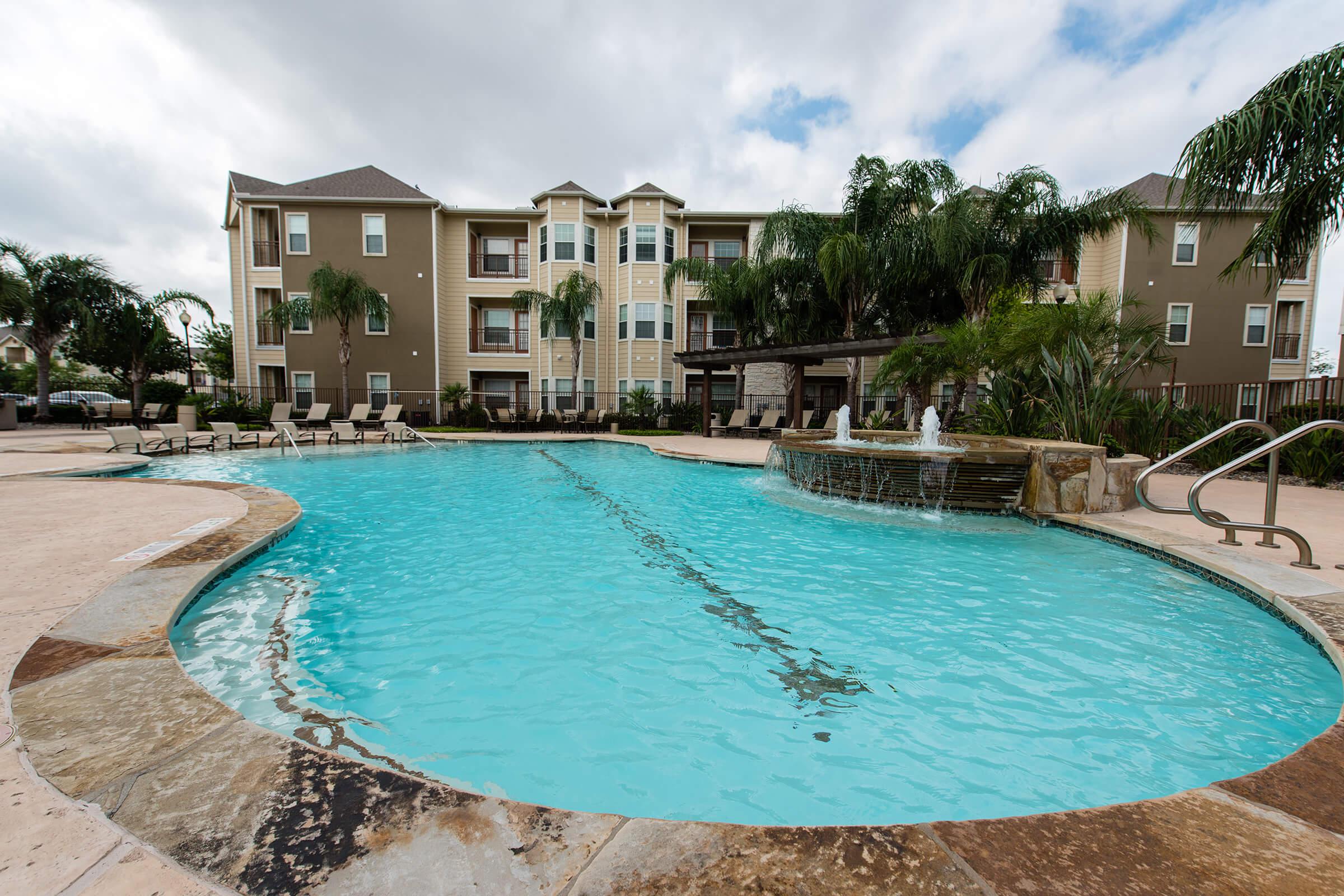 a pool next to a body of water