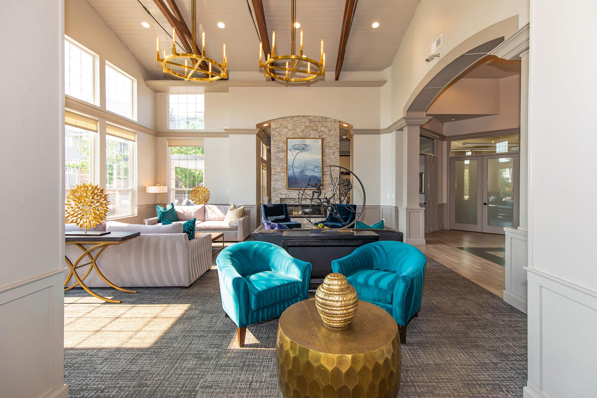 a living room filled with furniture and a window