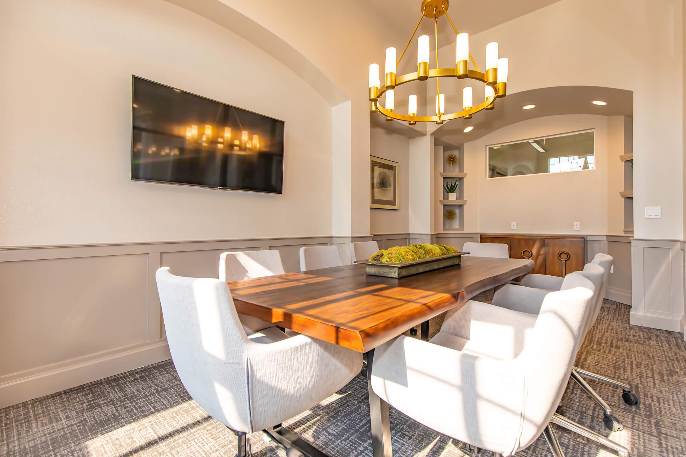 a modern living room with a large mirror