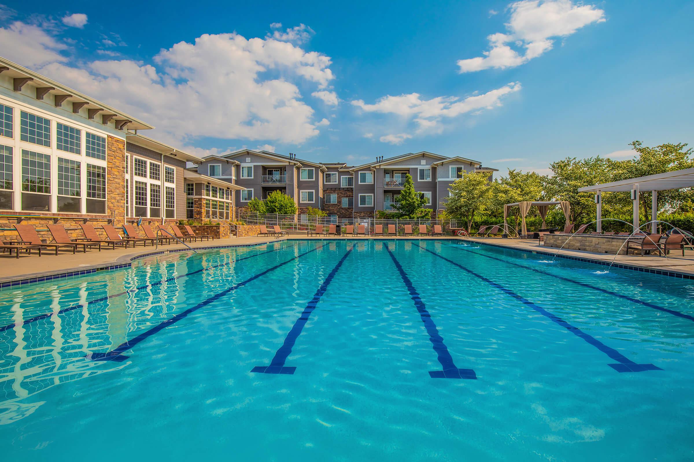 a pool next to a body of water