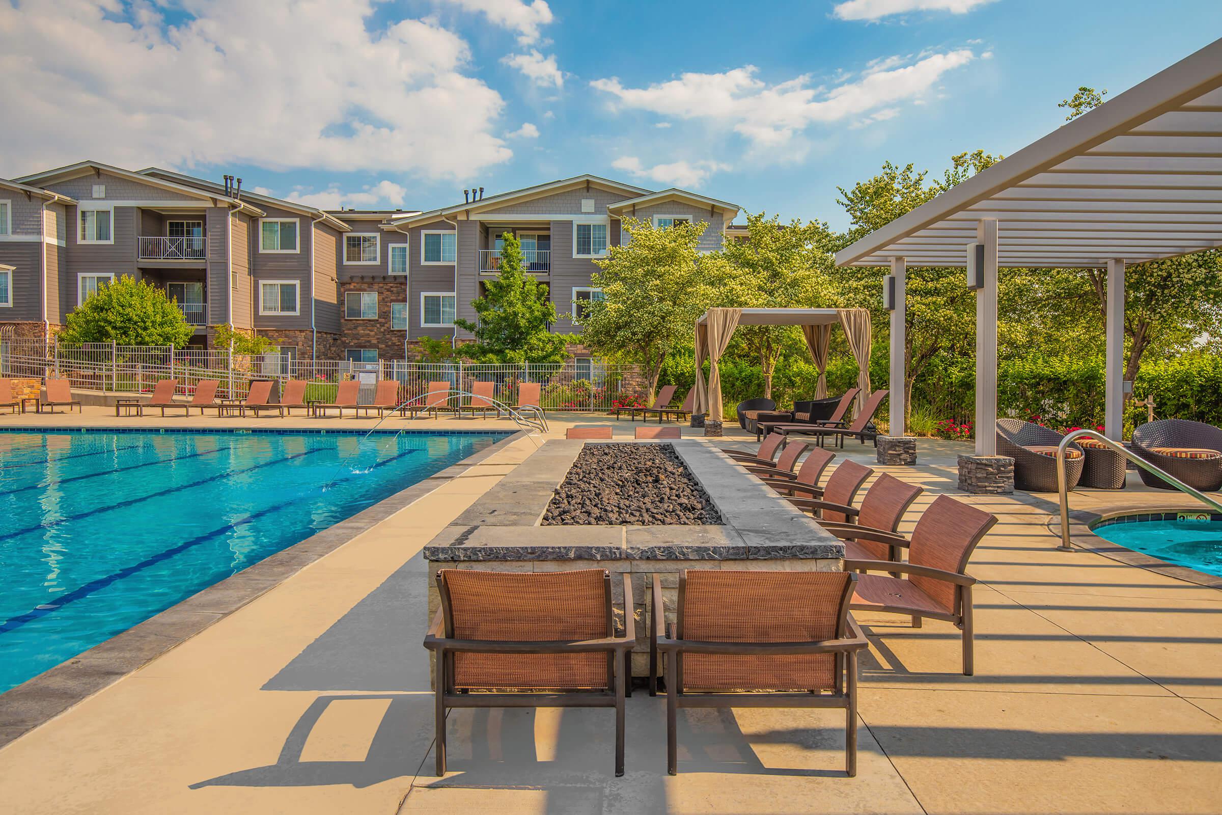 a pool in front of a building