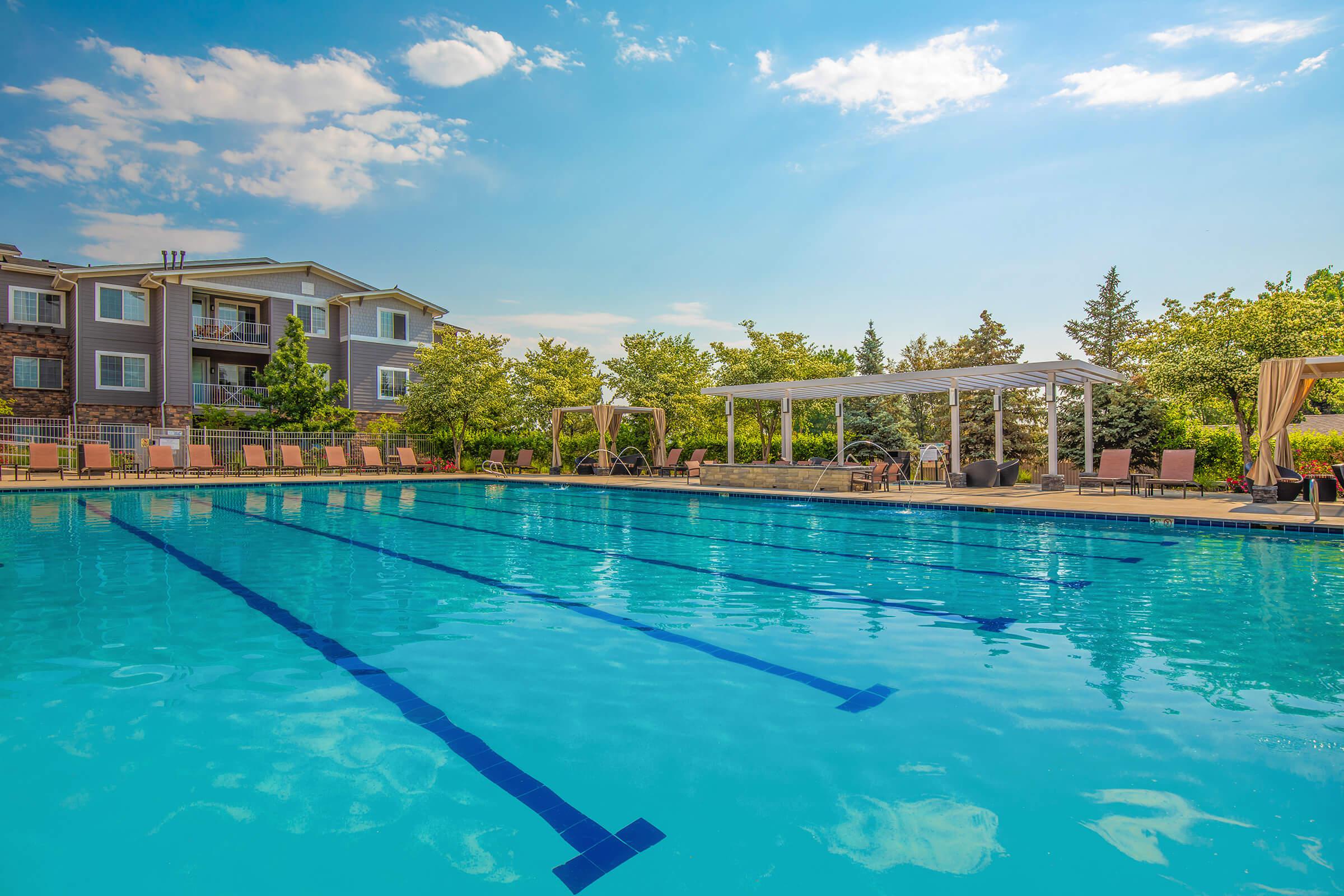 a pool next to a body of water