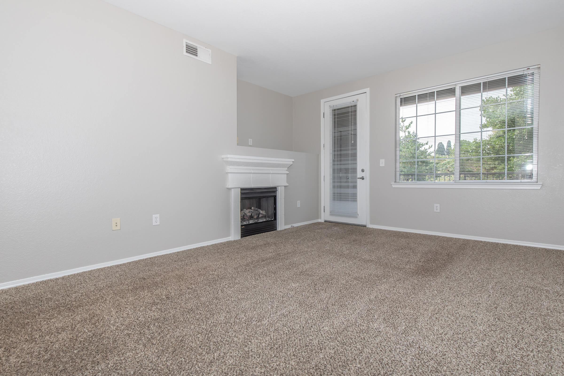 a bedroom with a large window