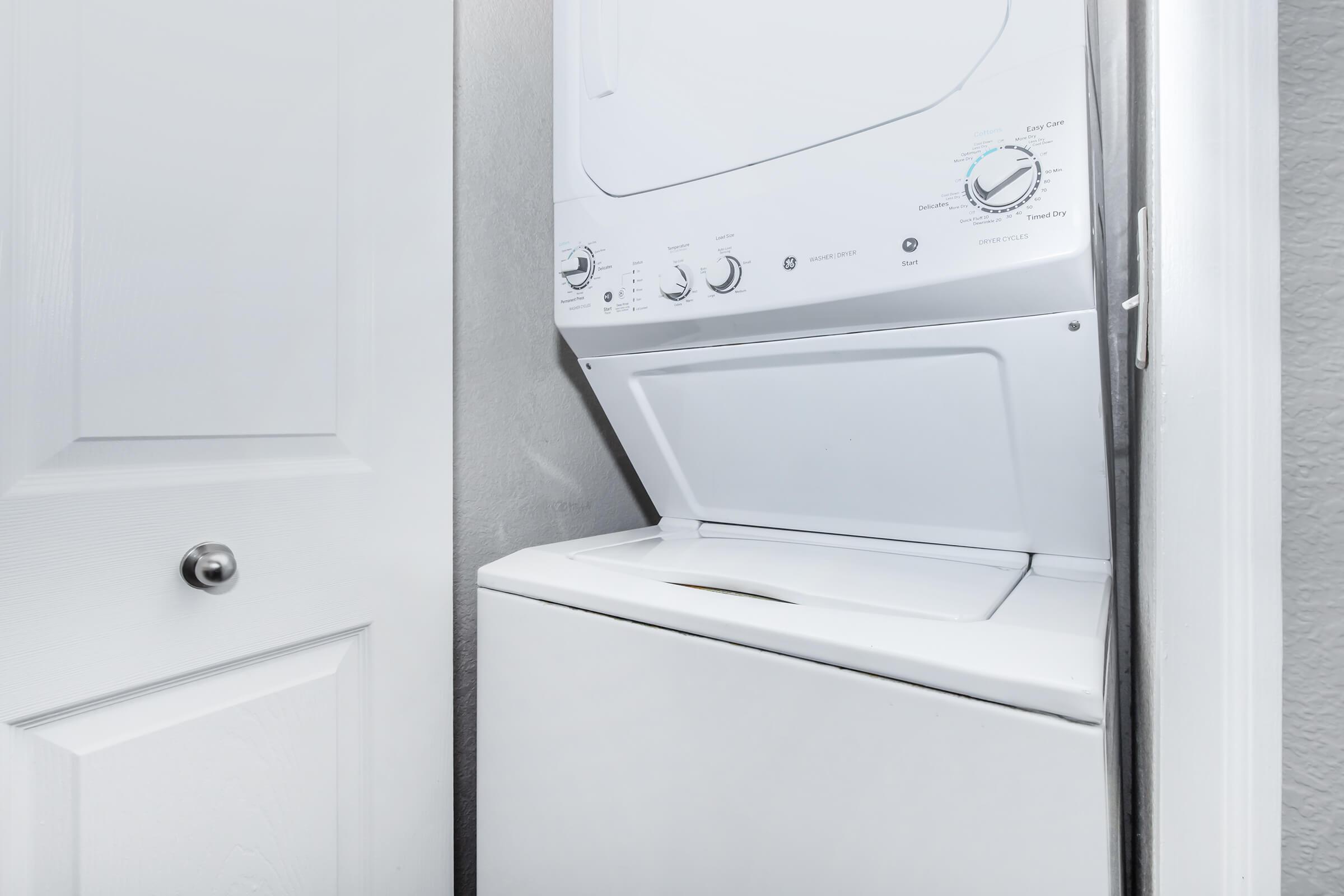 a stove top oven sitting inside of a refrigerator