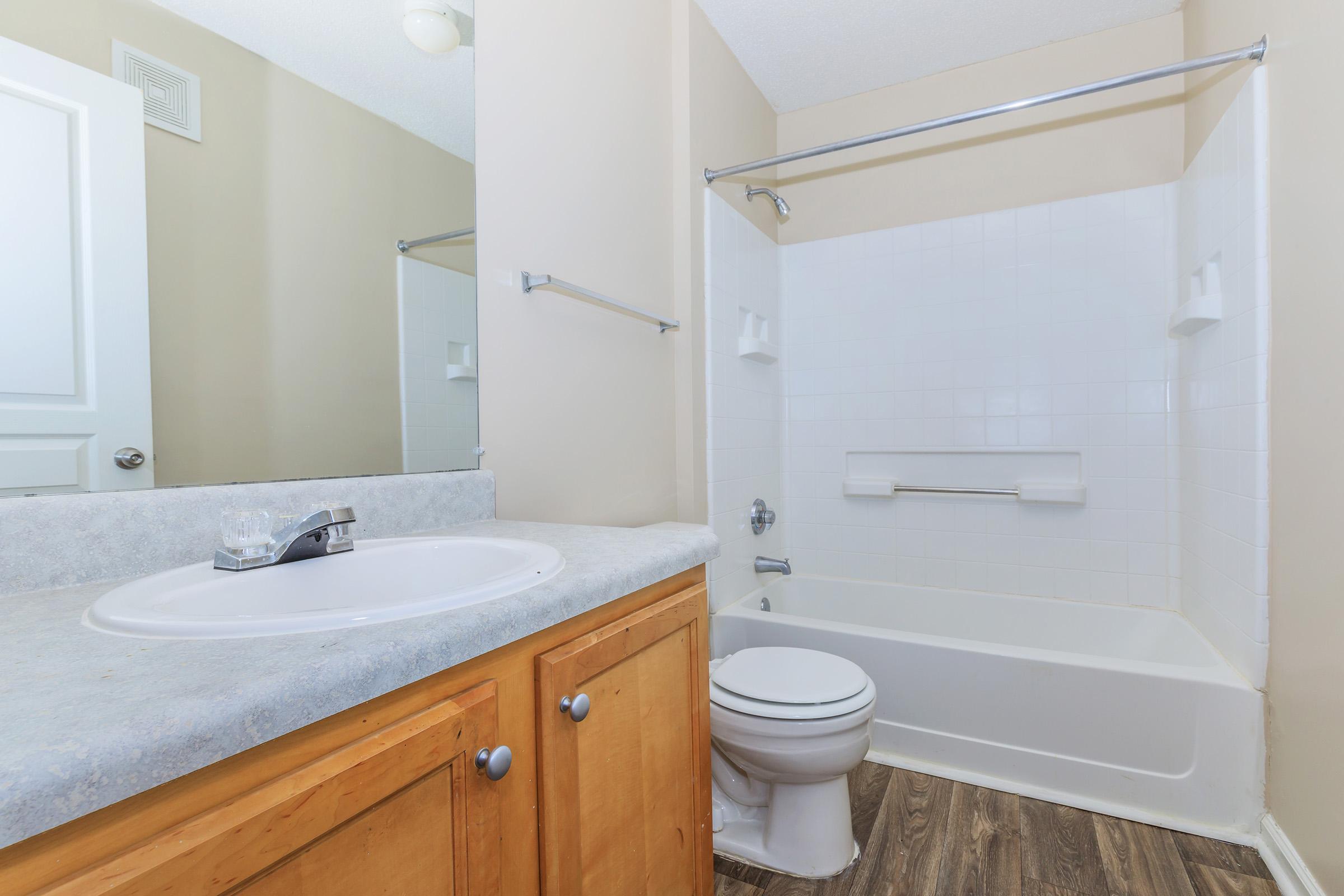 bathroom with sink shower and tub