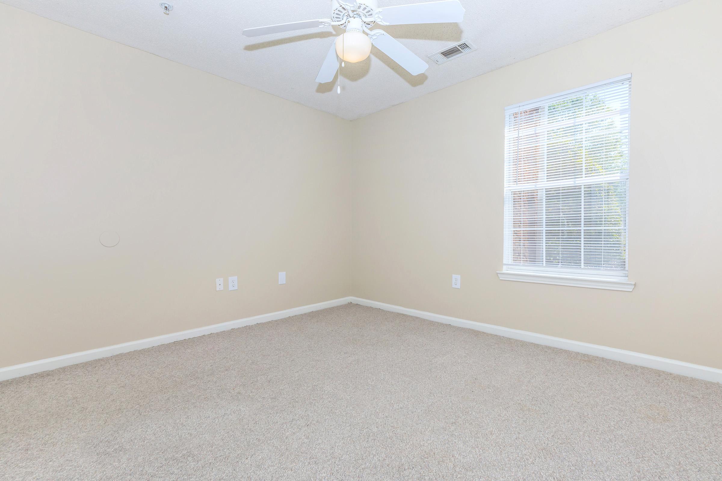 comfortable bedroom at Lakeshore Crossing Apartments