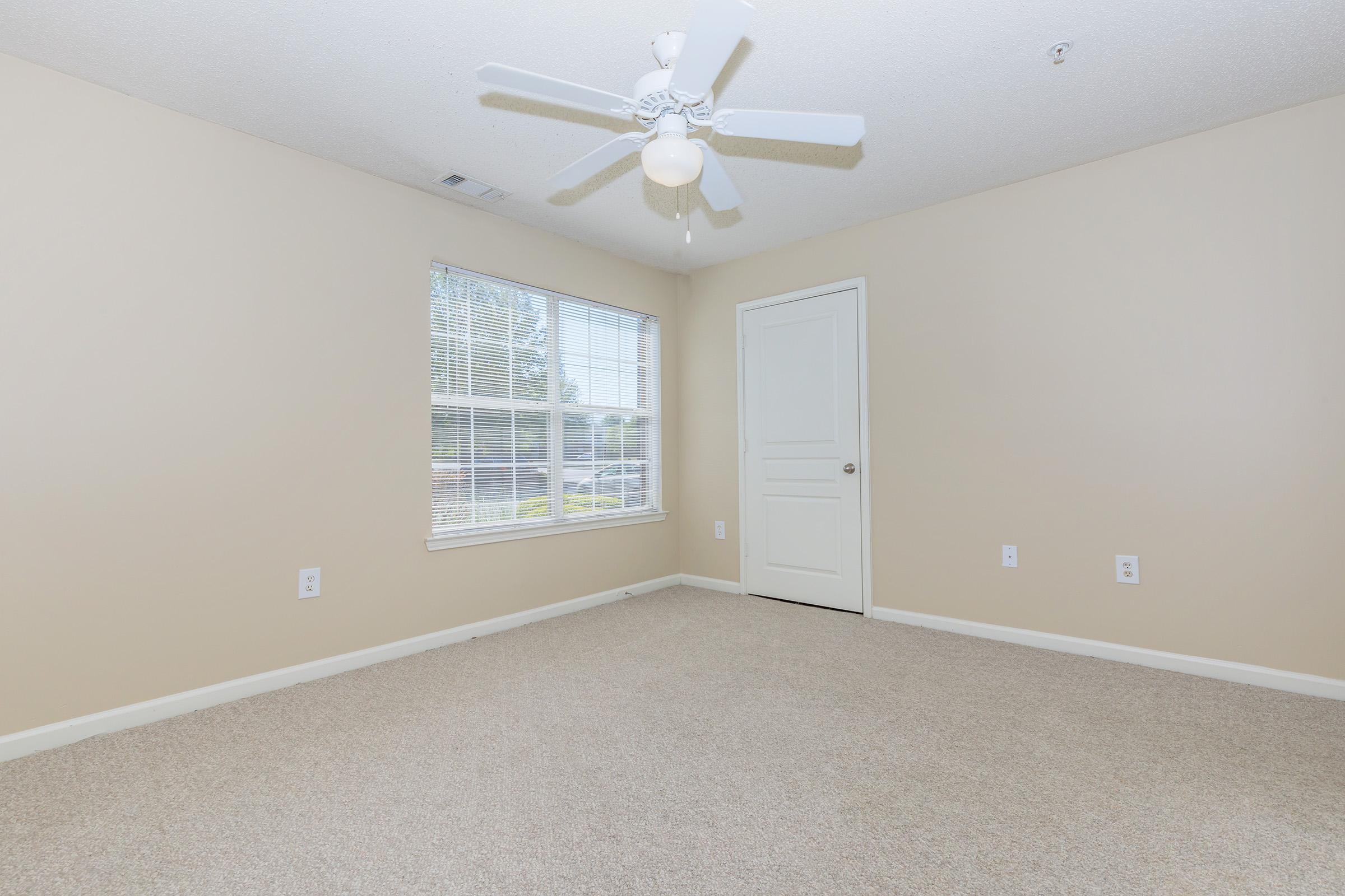 cozy bedroom at Lakeshore Crossing Apartments in Huntsville, AL