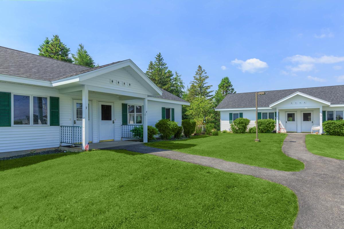 a large lawn in front of a house