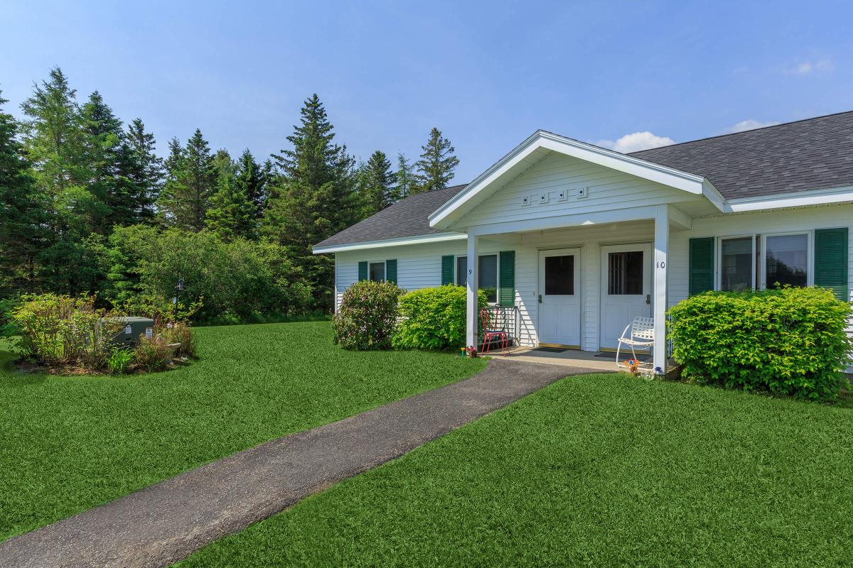 a large lawn in front of a house