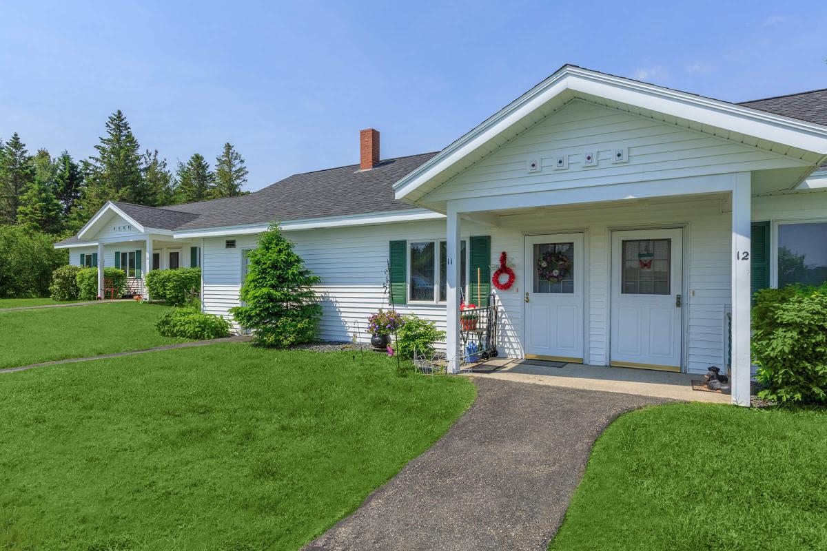 a large lawn in front of a house