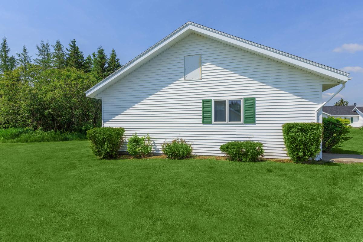 a large lawn in front of a house