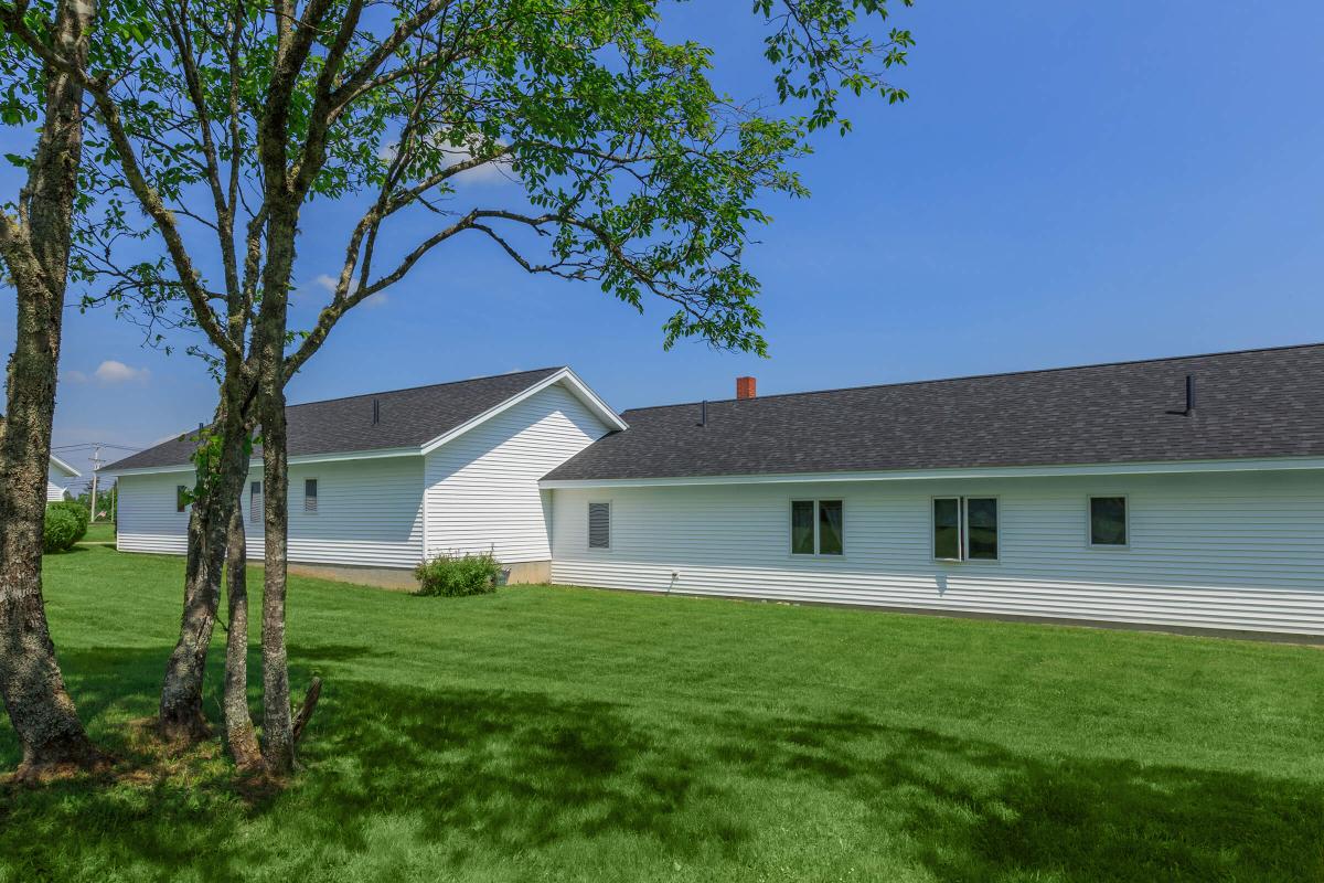 a large lawn in front of a house