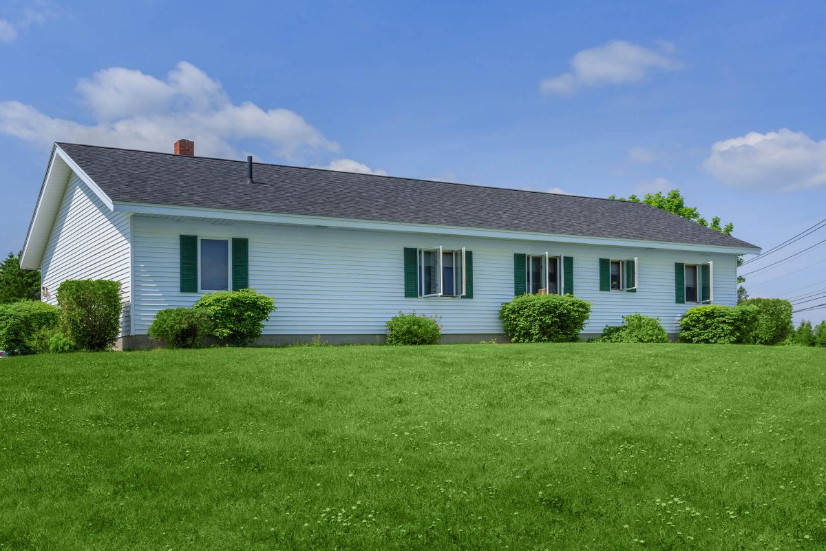 a large lawn in front of a house