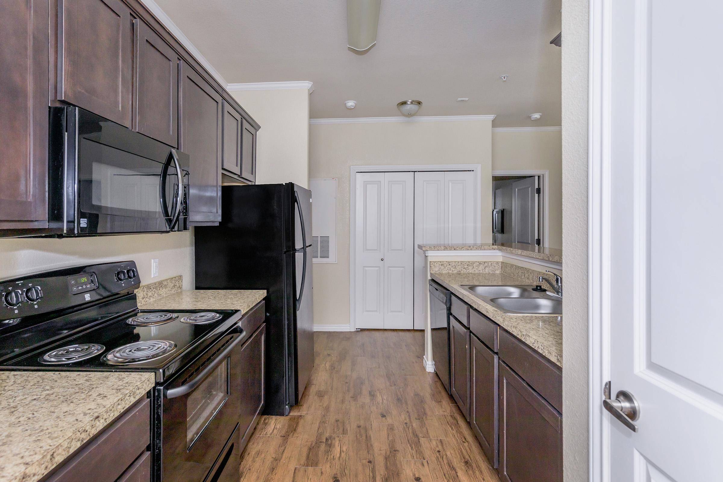 a modern kitchen with stainless steel appliances