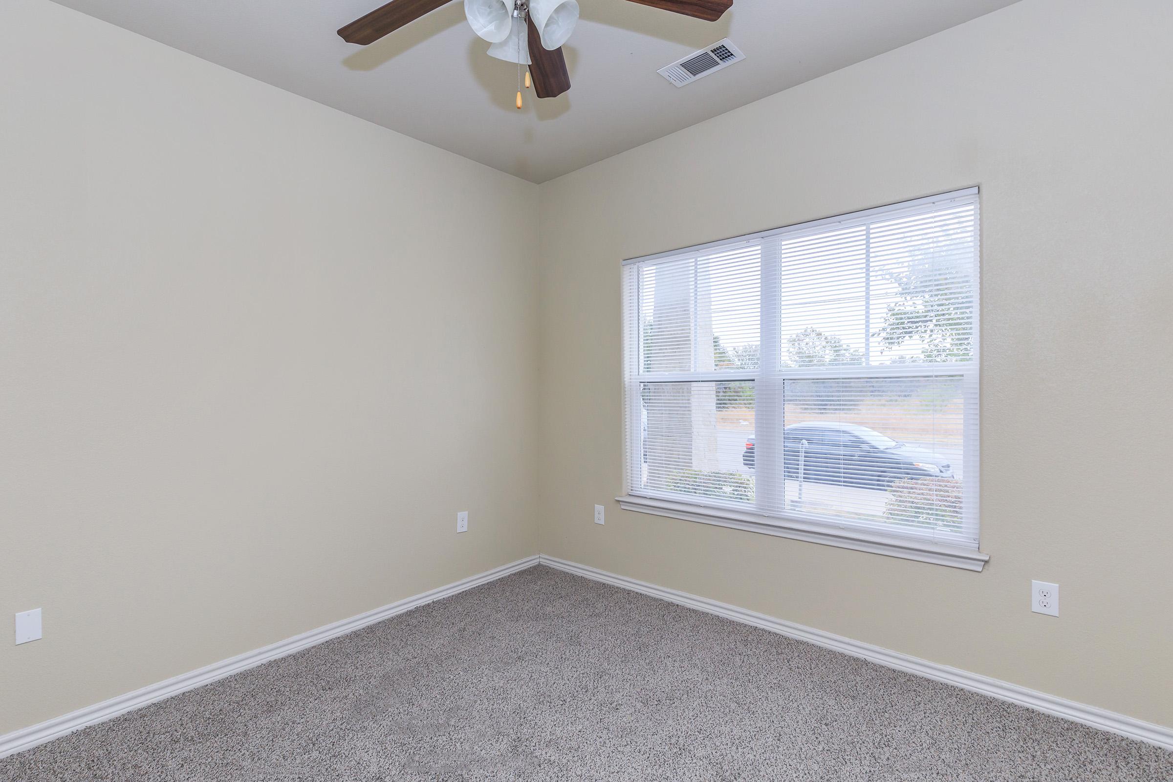 a room with a sink and a window