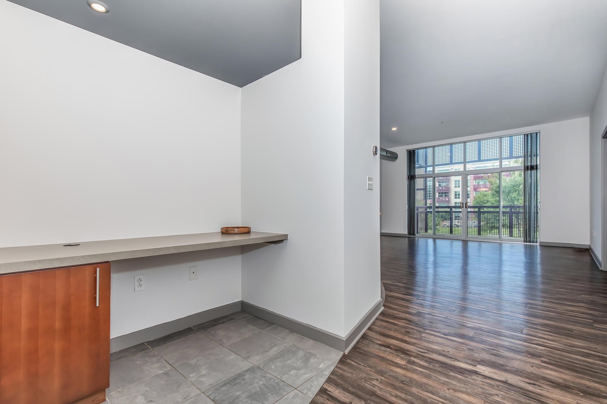 a kitchen with a wood floor