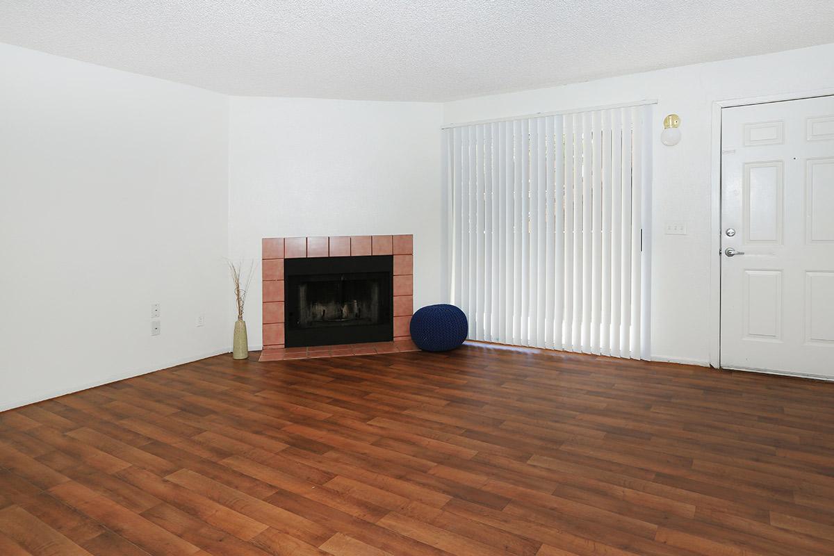 a living room with a wood floor