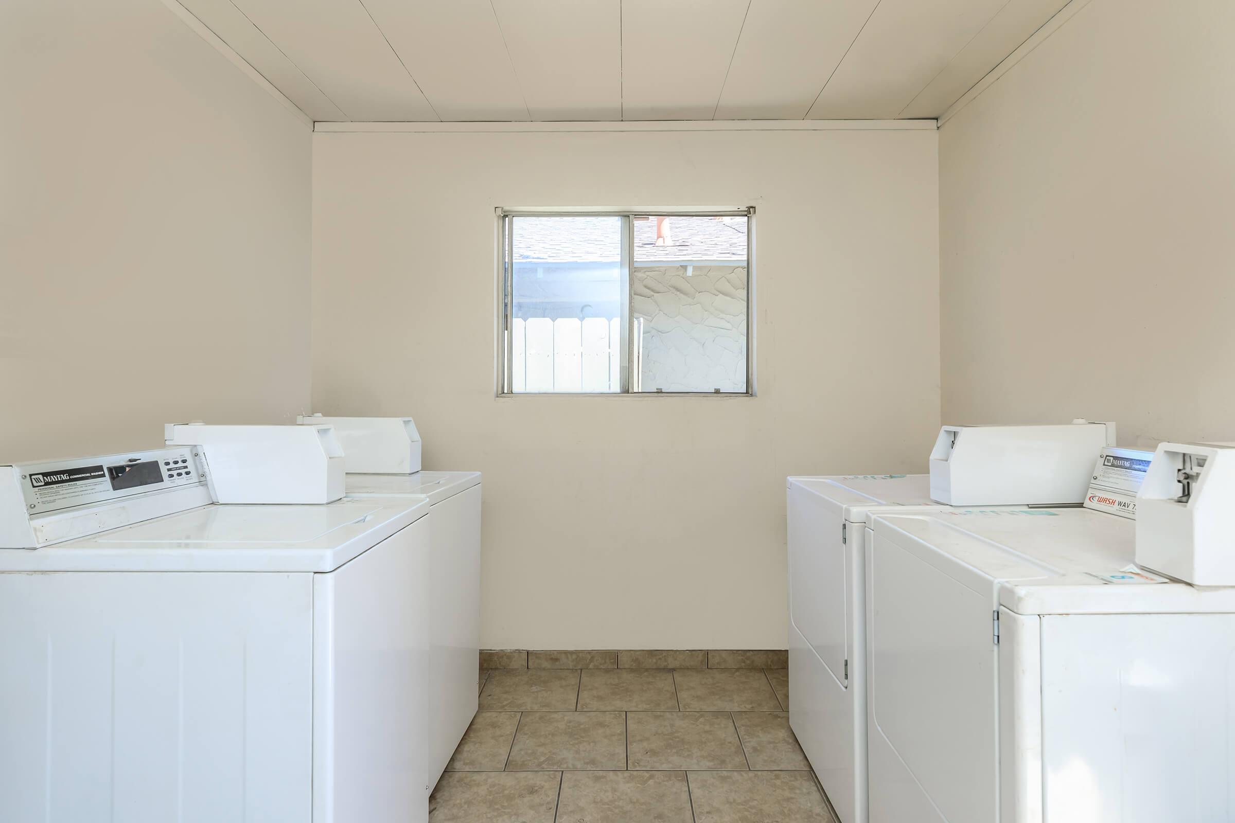 a refrigerator in a small room