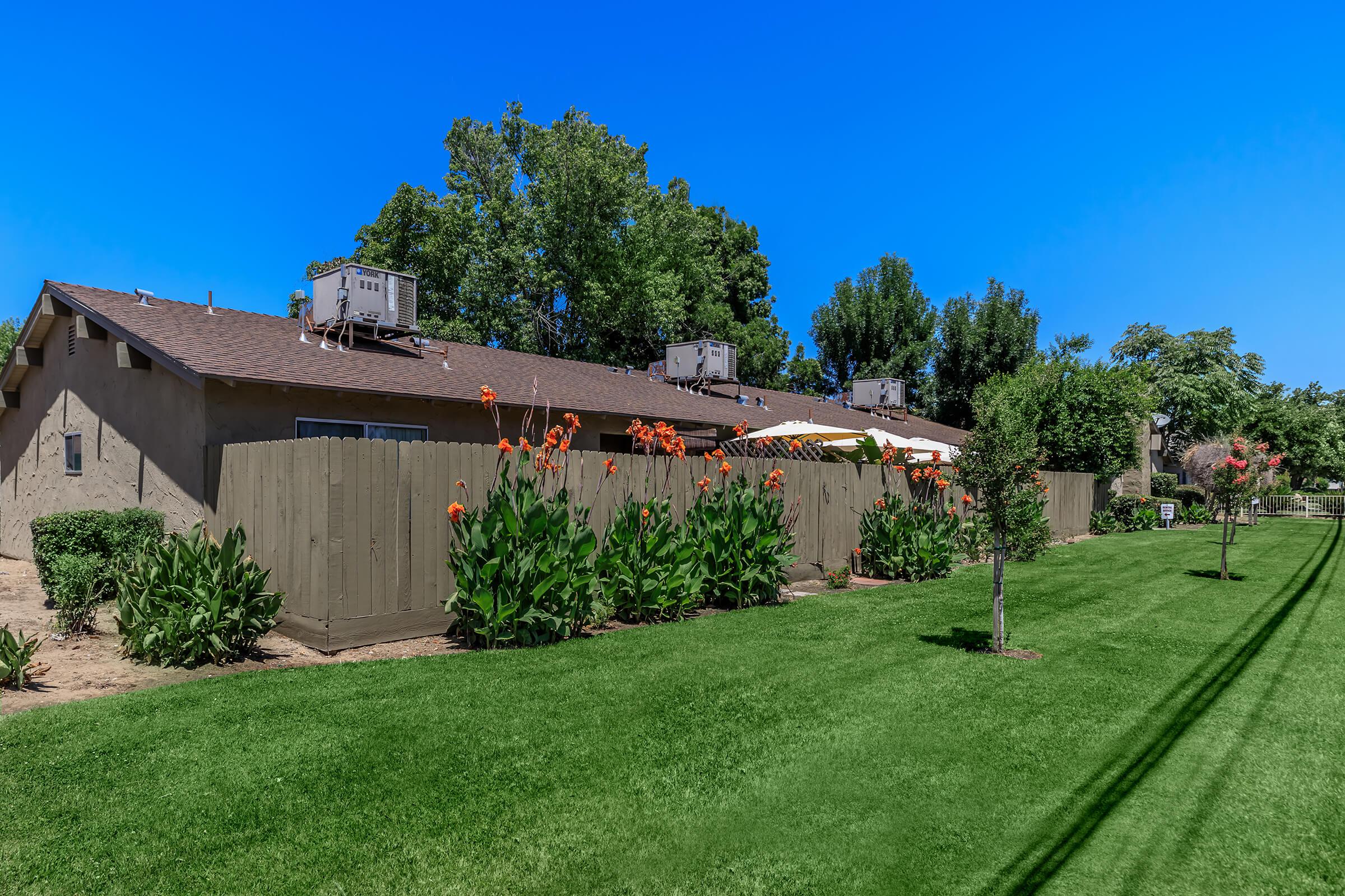 a garden in front of a house