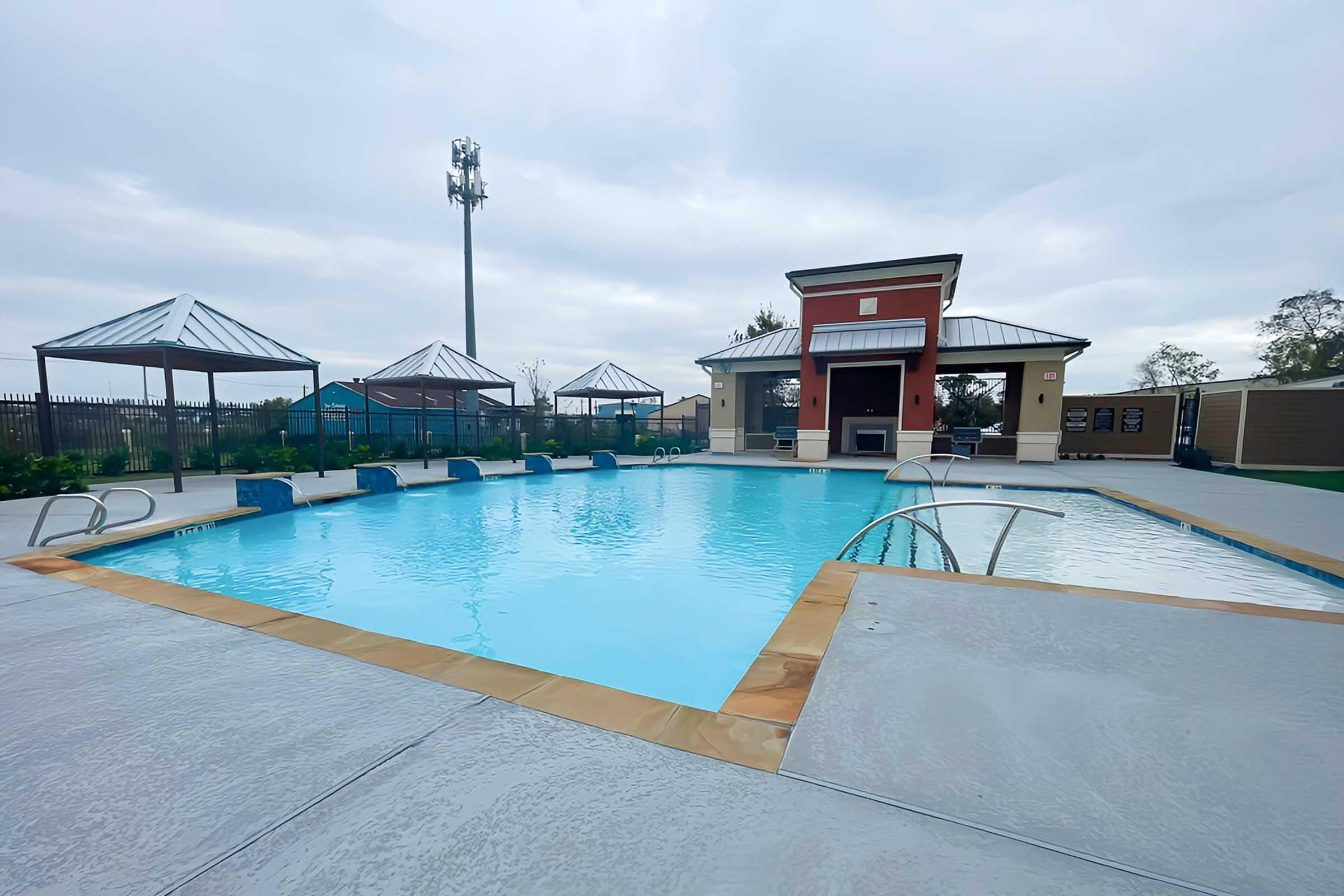 a pool next to a body of water