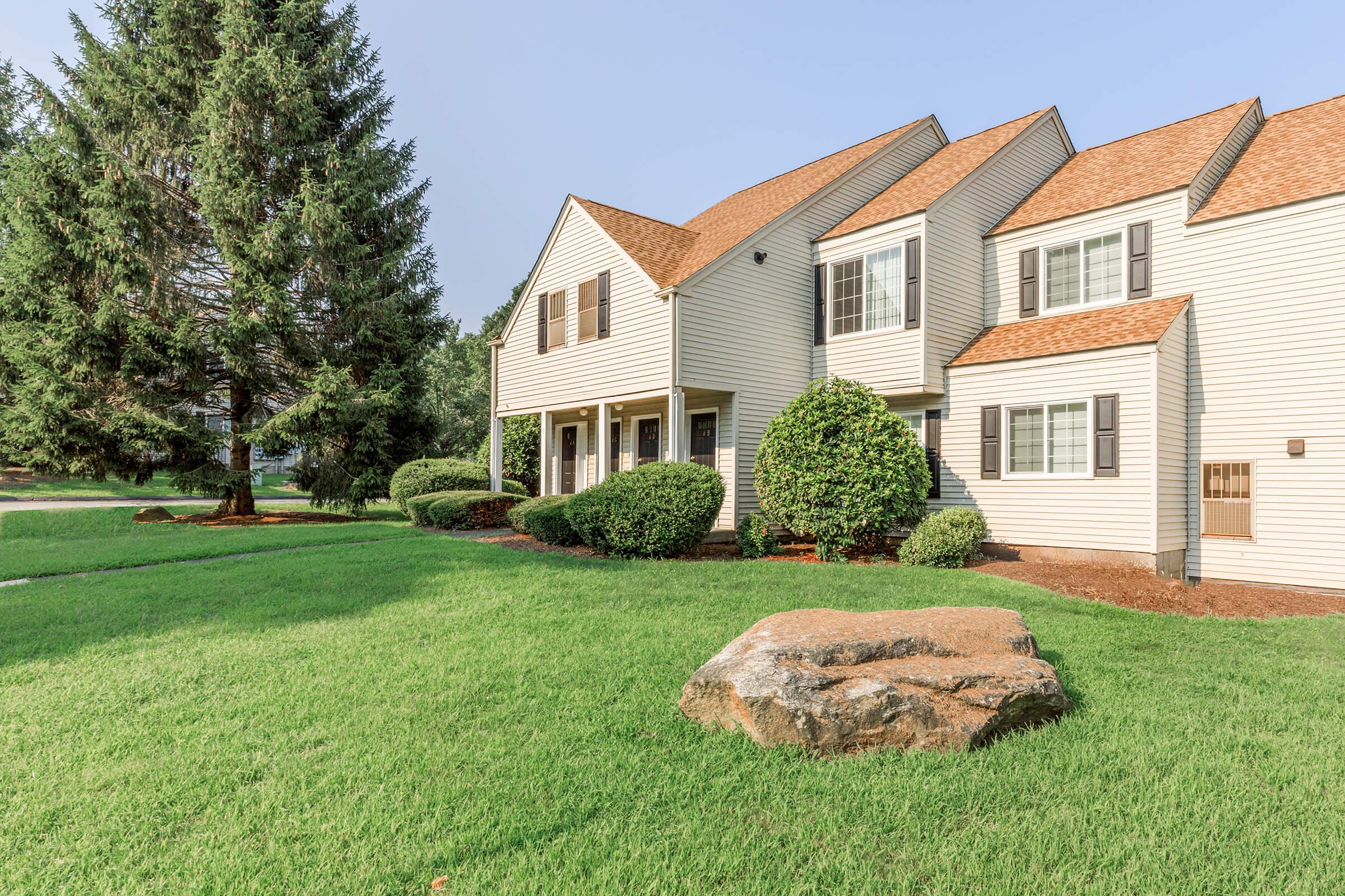 a large lawn in front of a house