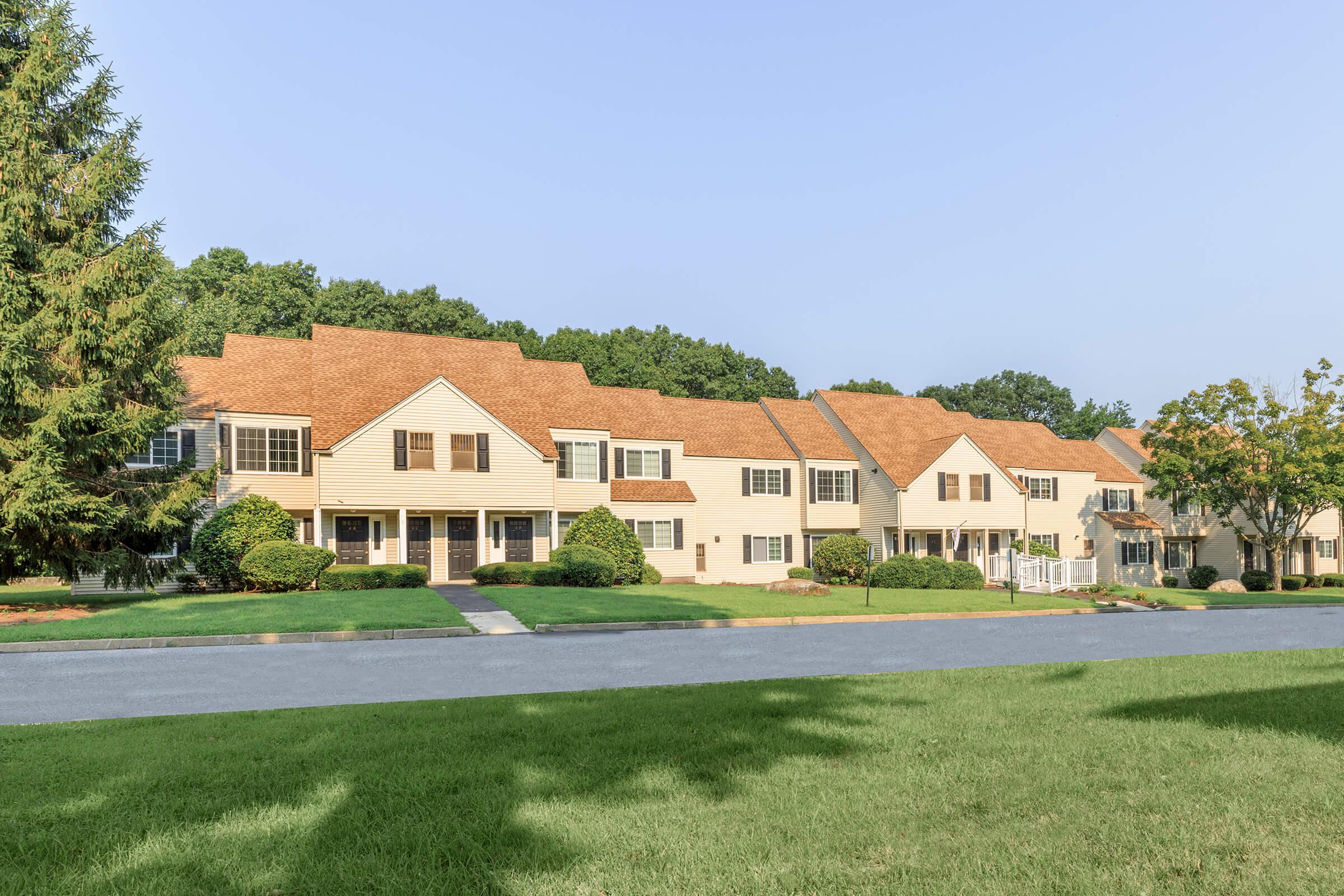 a large lawn in front of a house