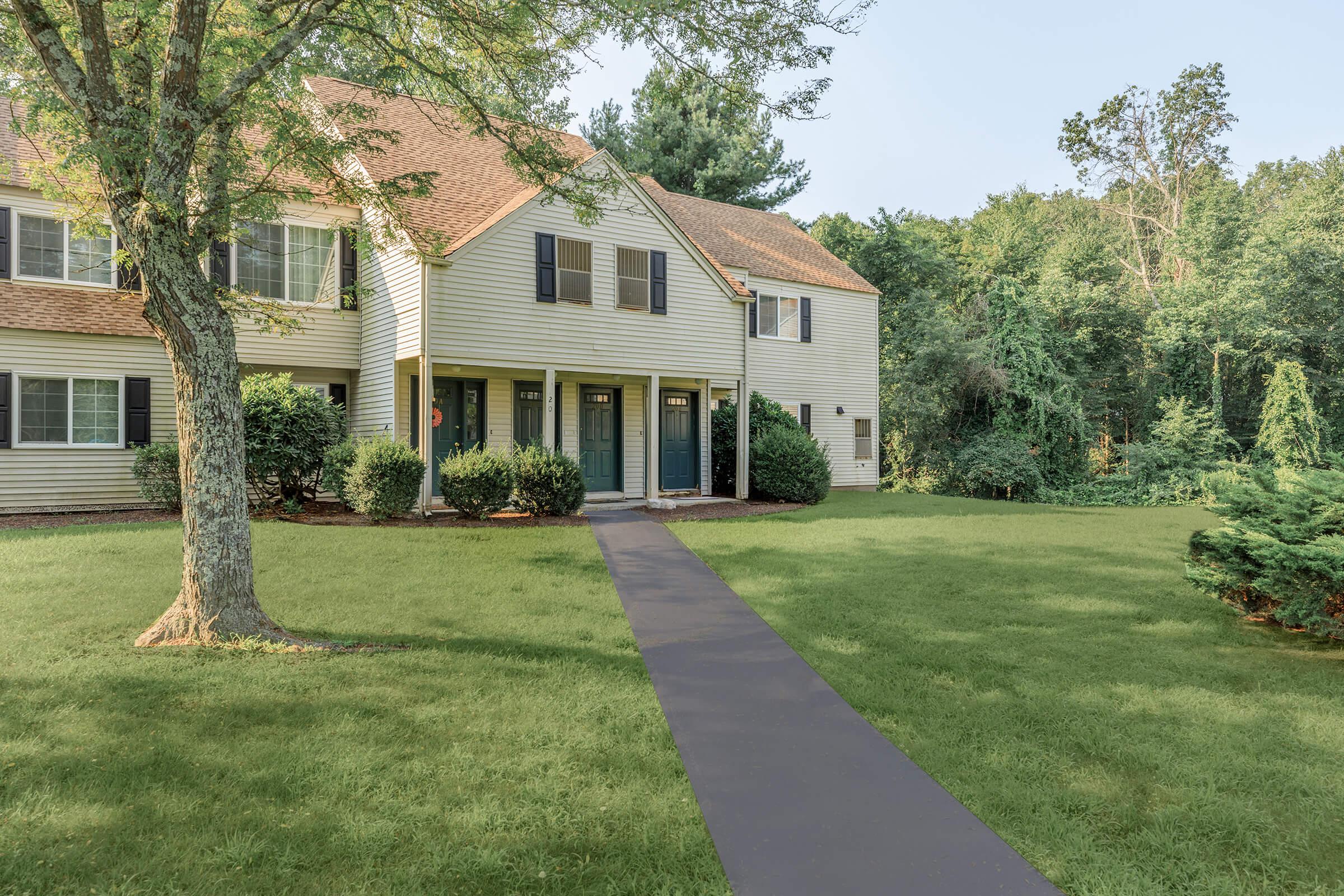 a large lawn in front of a house