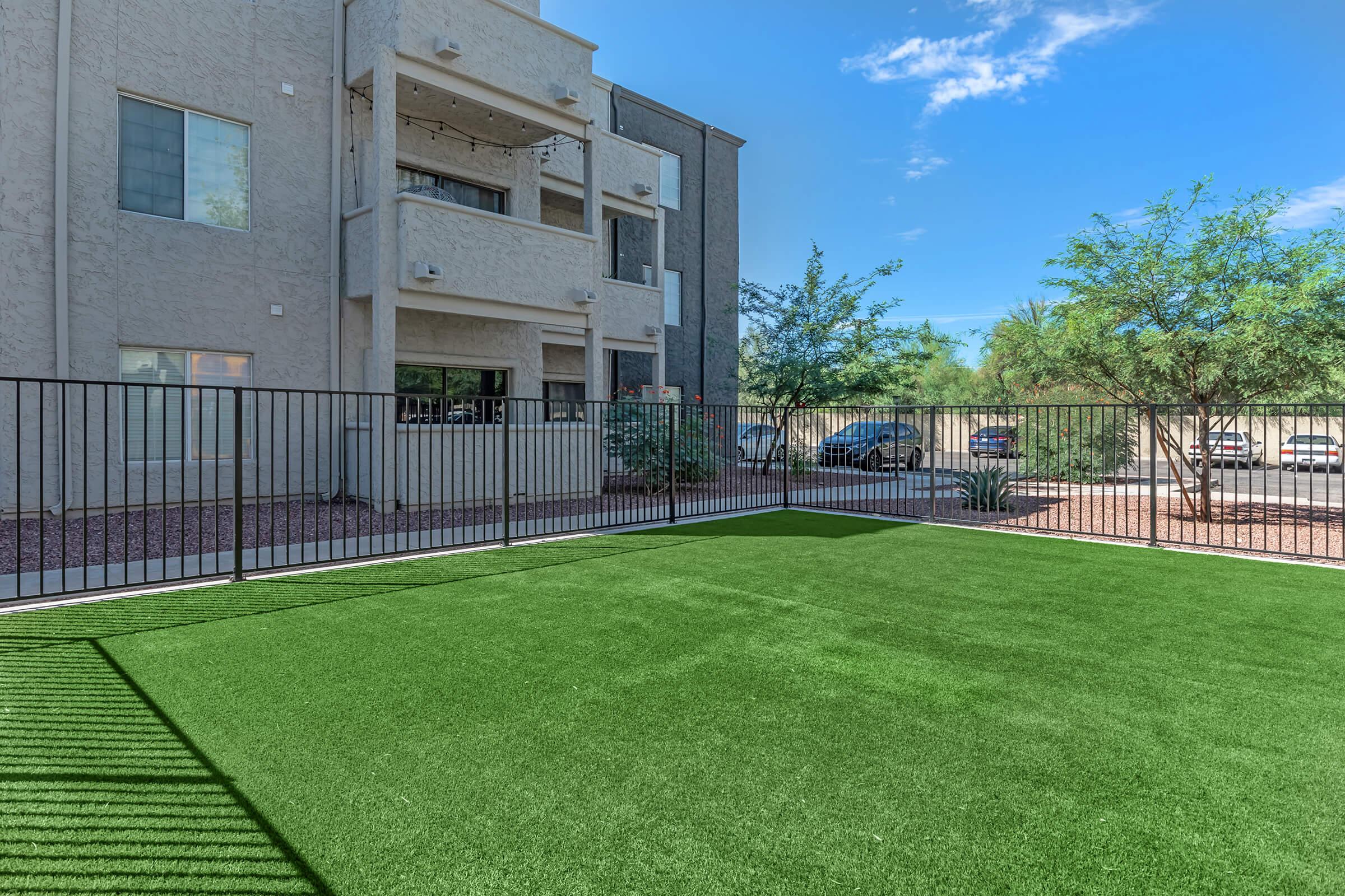 a large lawn in front of a building