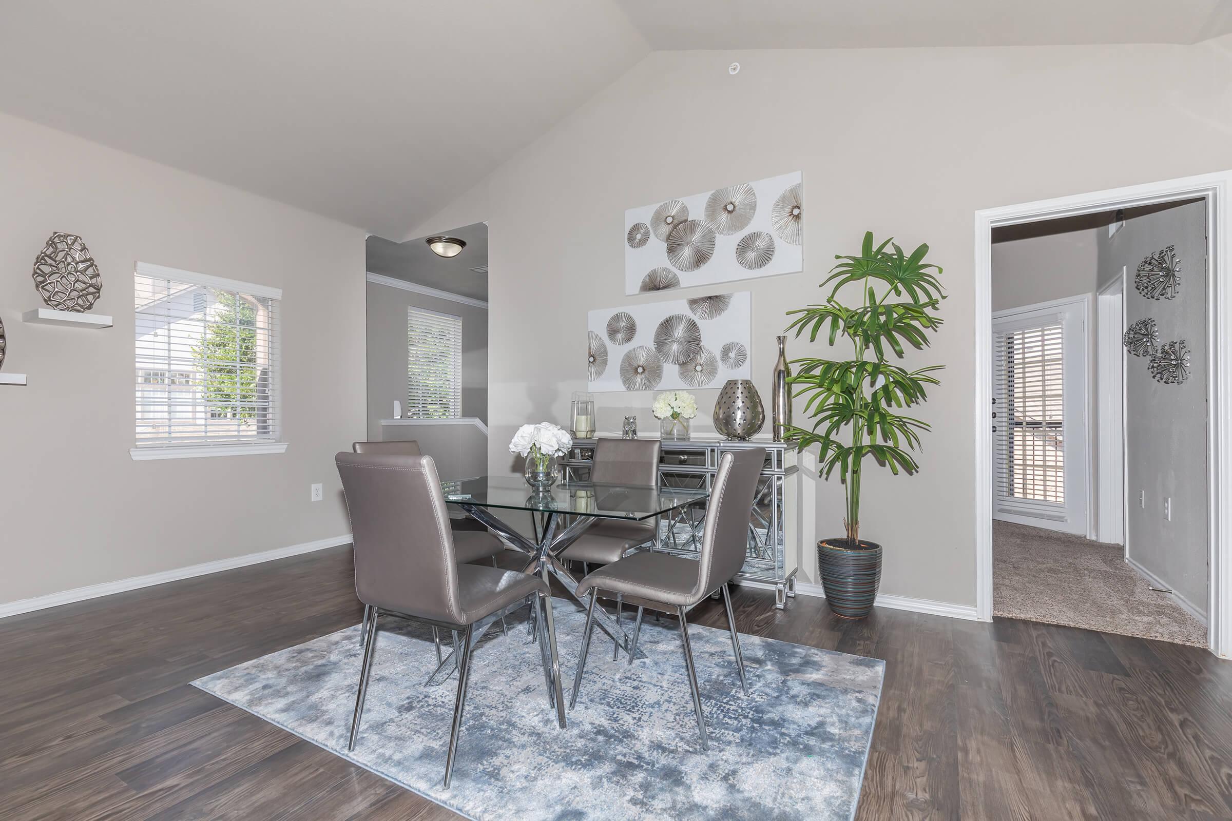 a living room filled with furniture and a window