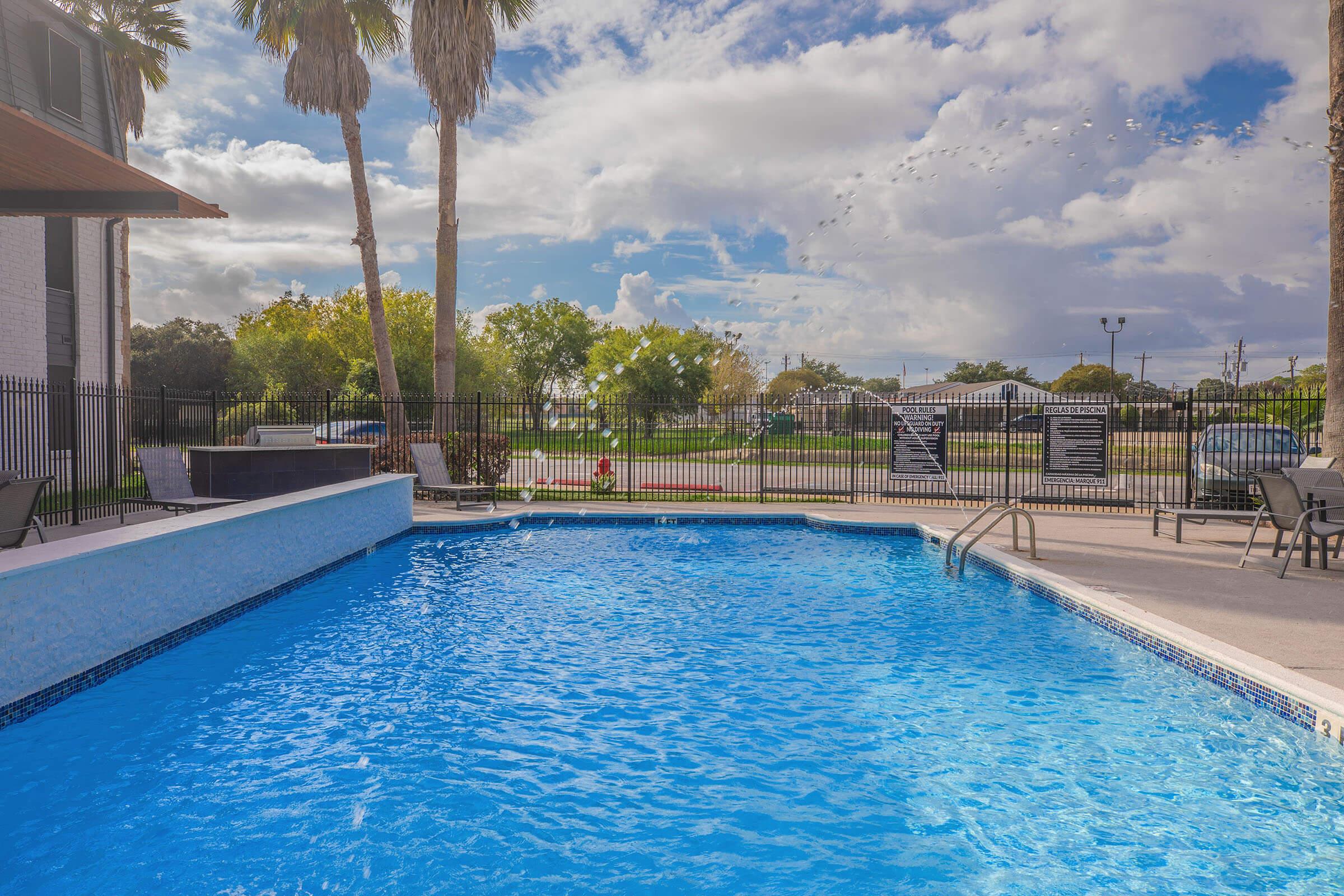 a pool next to a body of water