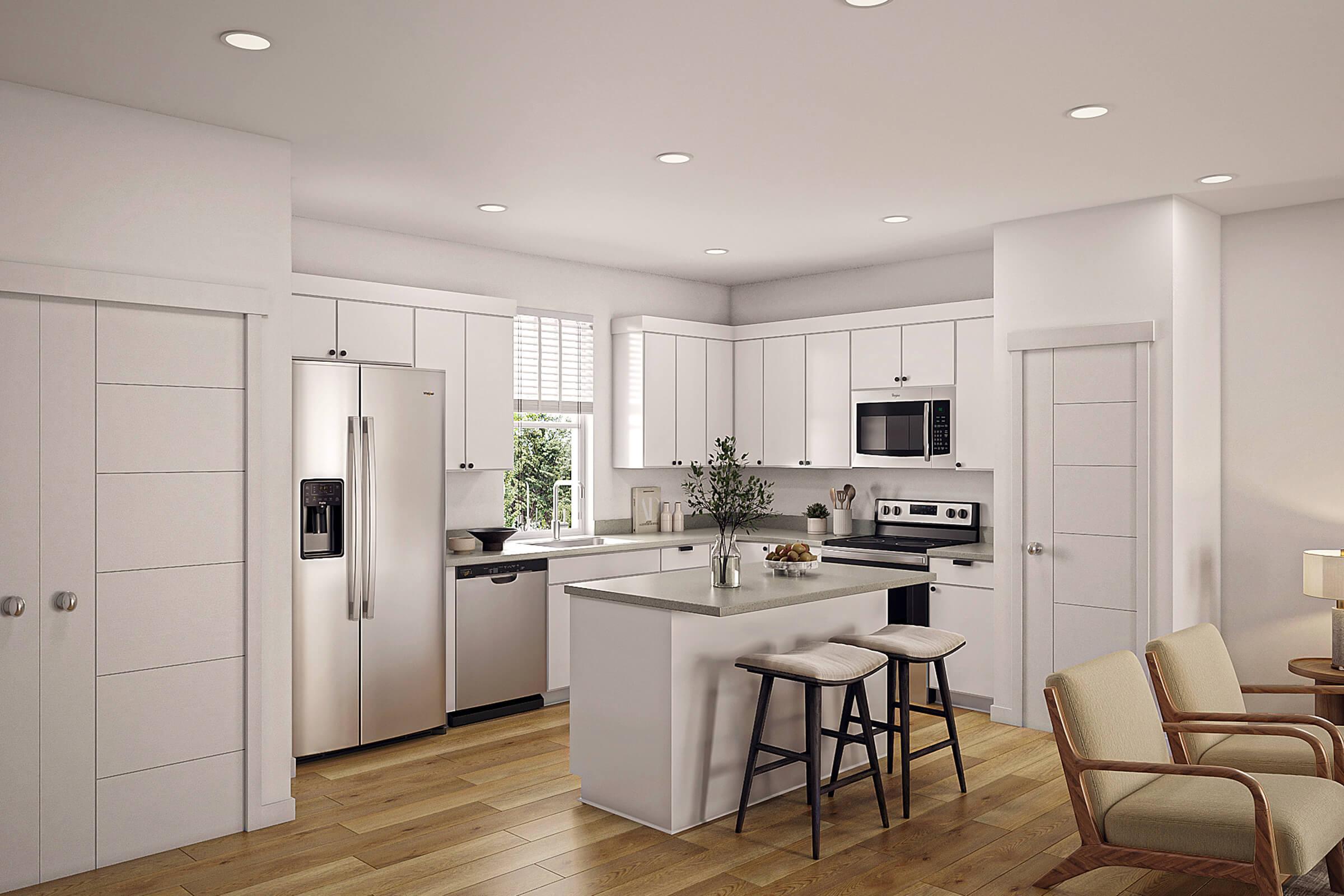 Modern kitchen interior featuring white cabinets, stainless steel appliances, and a central island with bar stools. Natural light streams in through a window, and a cozy seating area is visible. The space has a clean, minimalist design with wooden flooring and neutral colors.