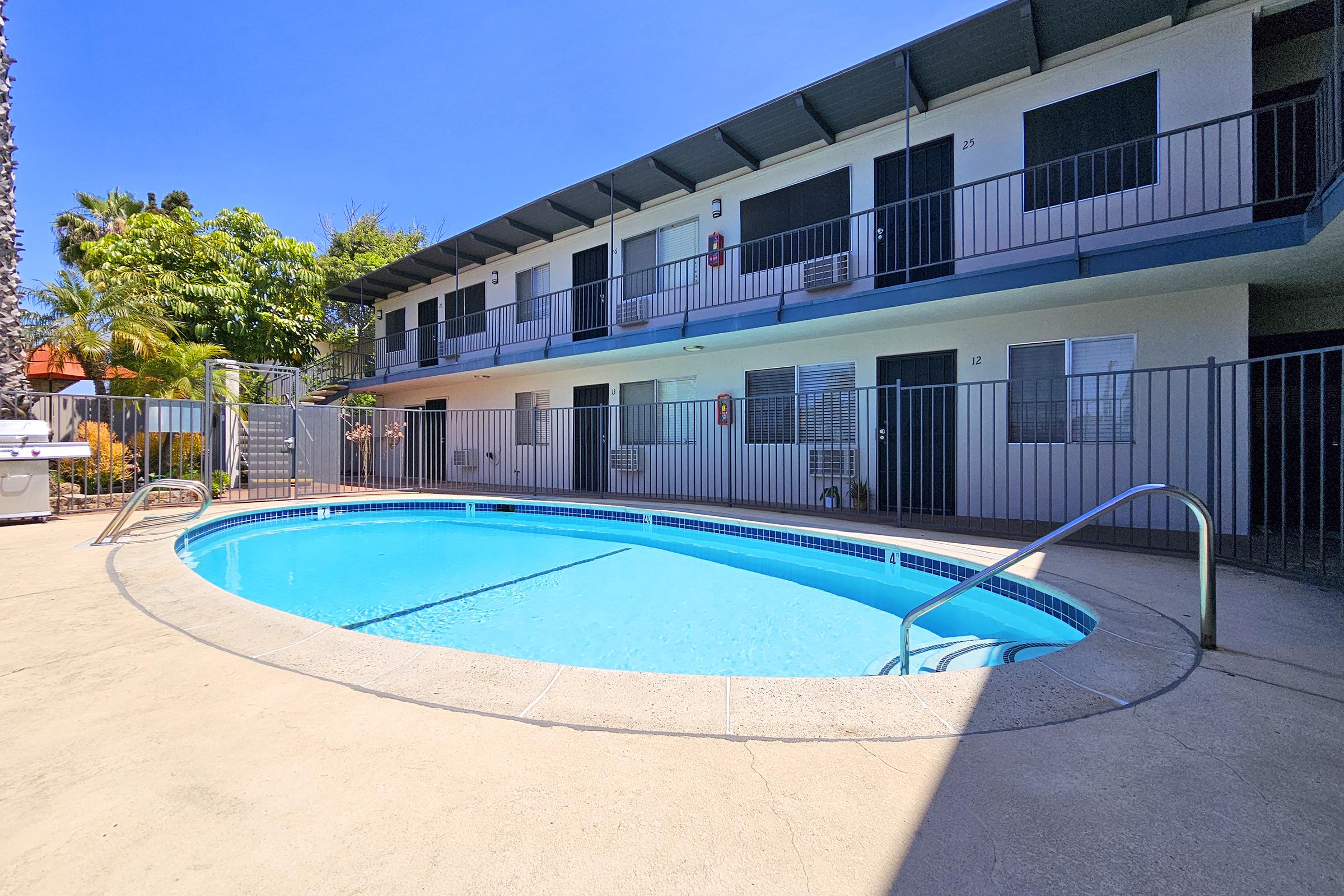 a pool next to a building