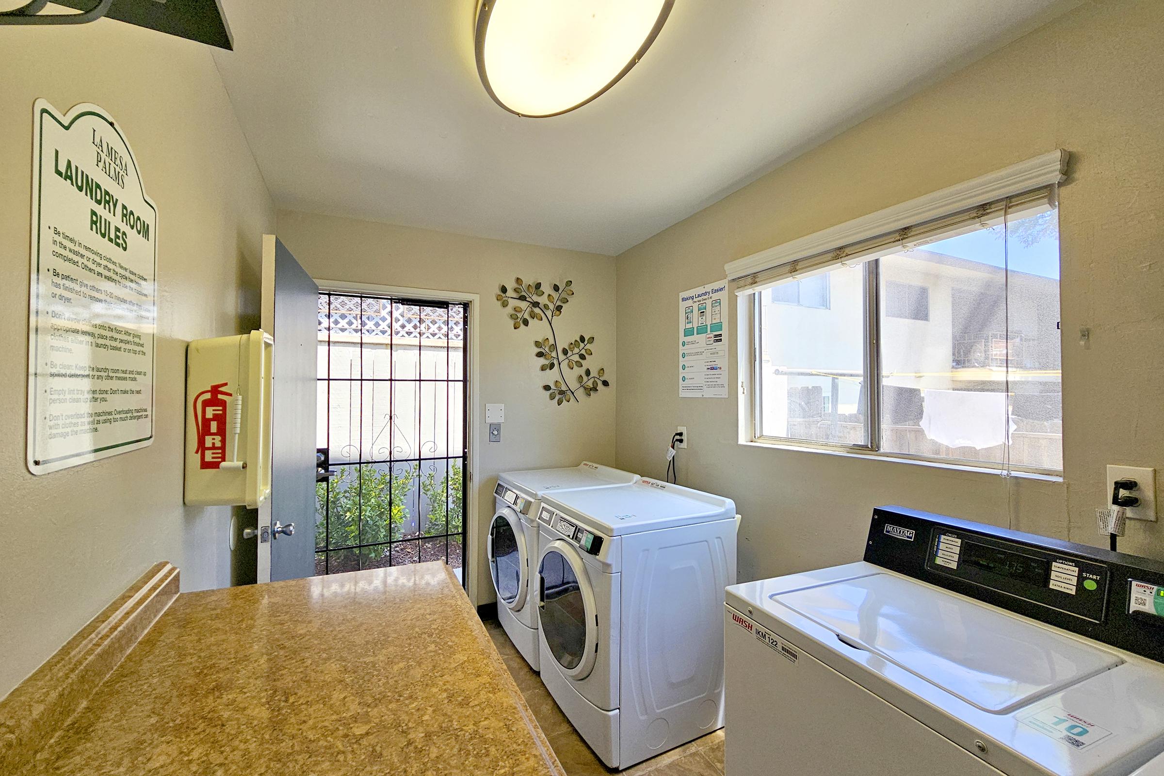 a kitchen with a sink and a window