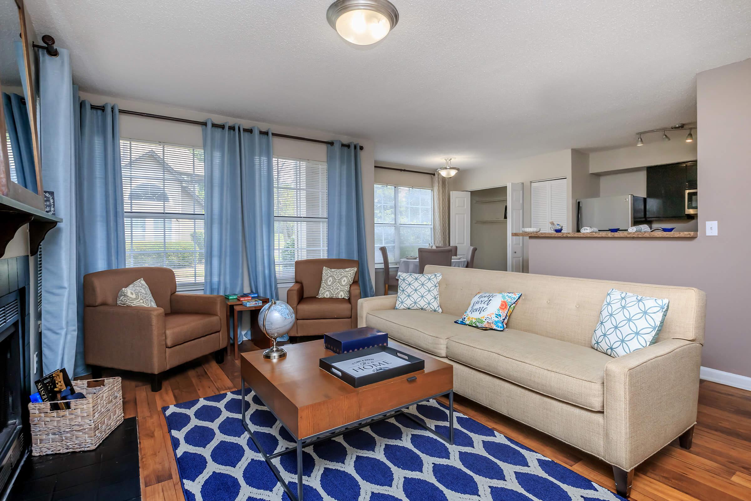 YOUR NEW LIVING ROOM AT SUMMERLAKE APARTMENTS