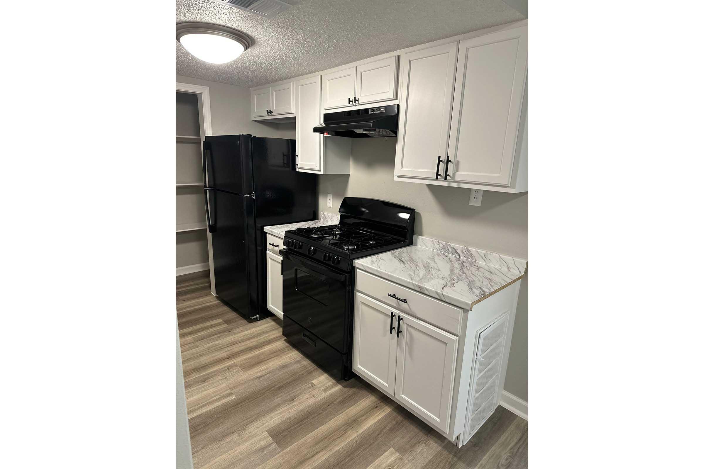 a stainless steel refrigerator in a kitchen