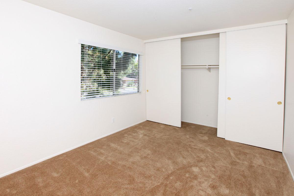 a large white refrigerator in a kitchen