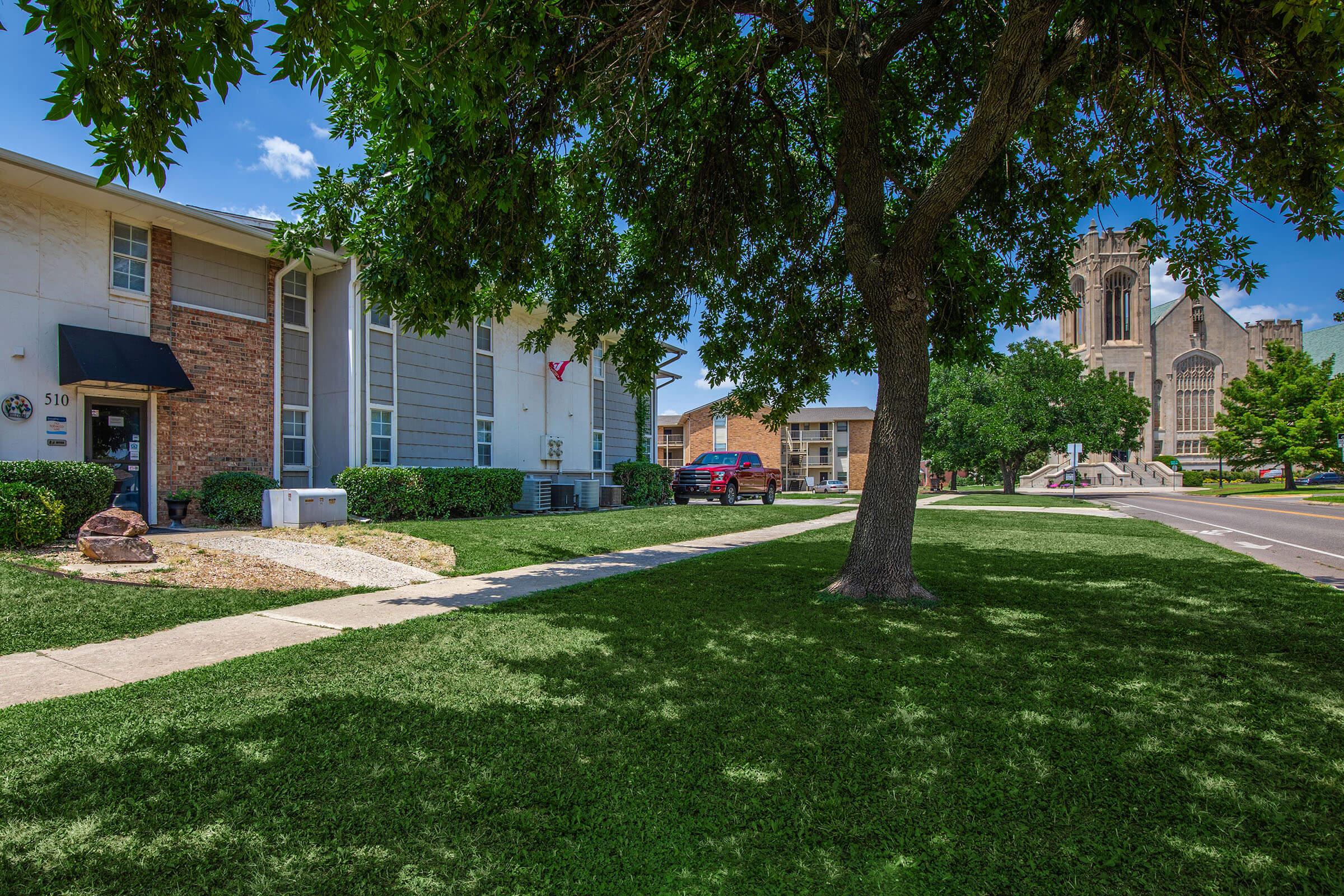 a large lawn in front of a house