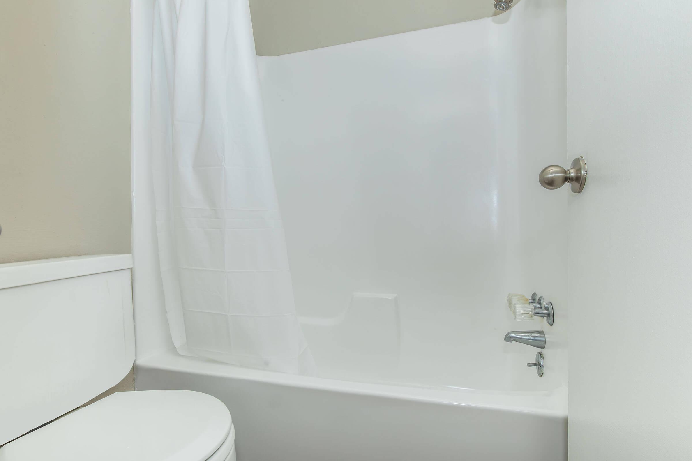 a close up of a shower in a small room