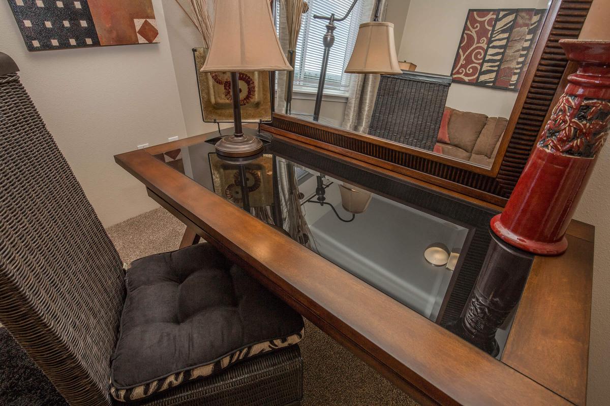 a living room with a leather chair