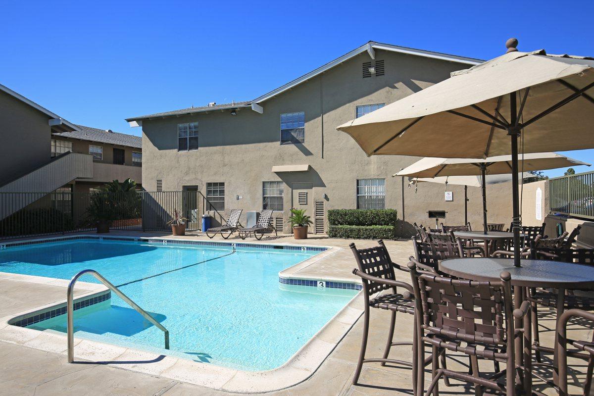 a house with a large pool of water