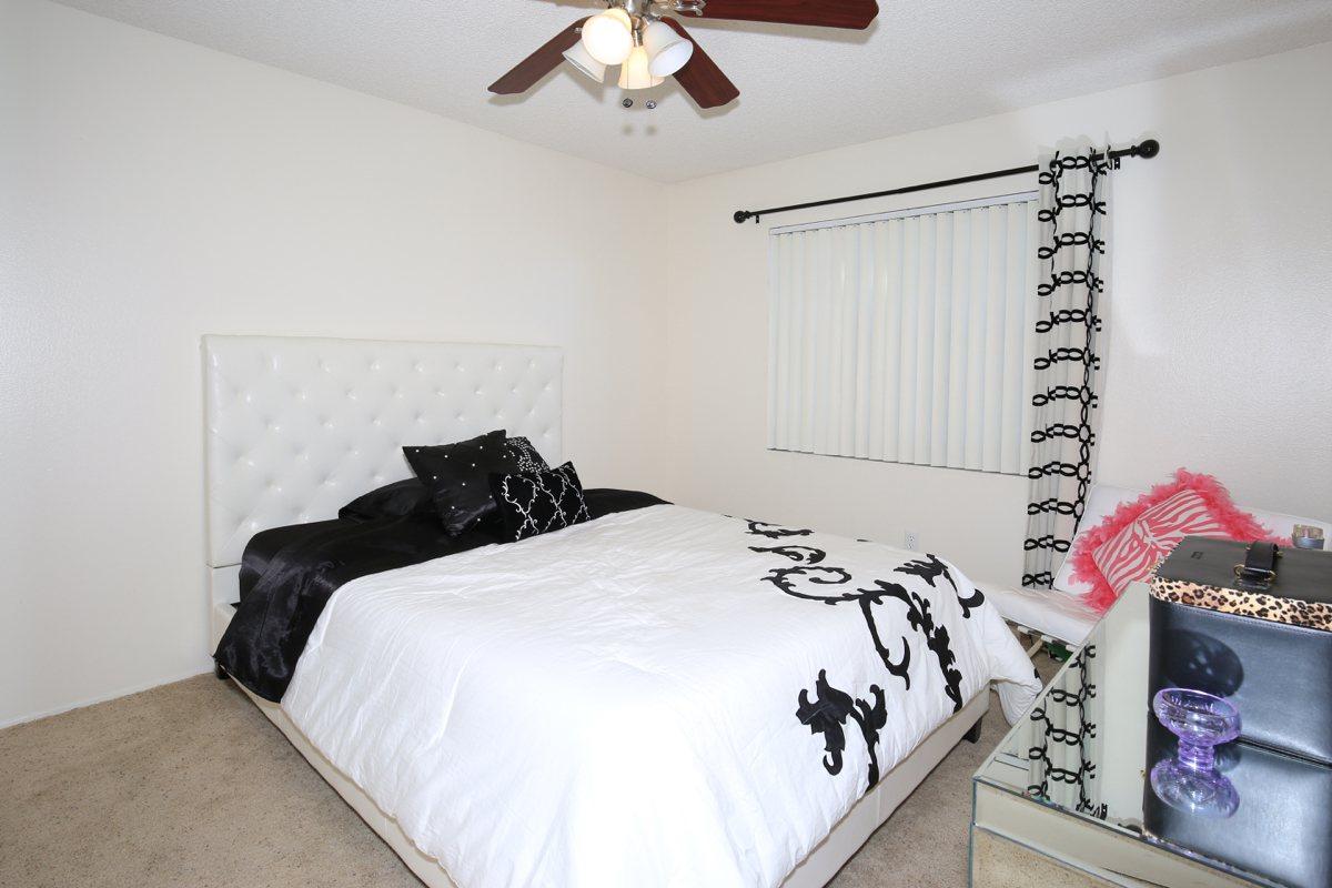 a made bed in a bedroom