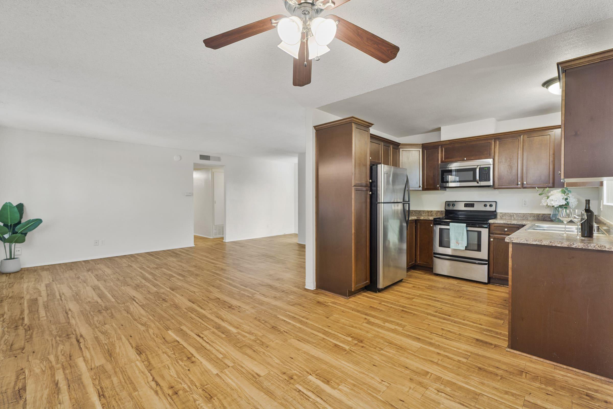 a large kitchen with stainless steel appliances