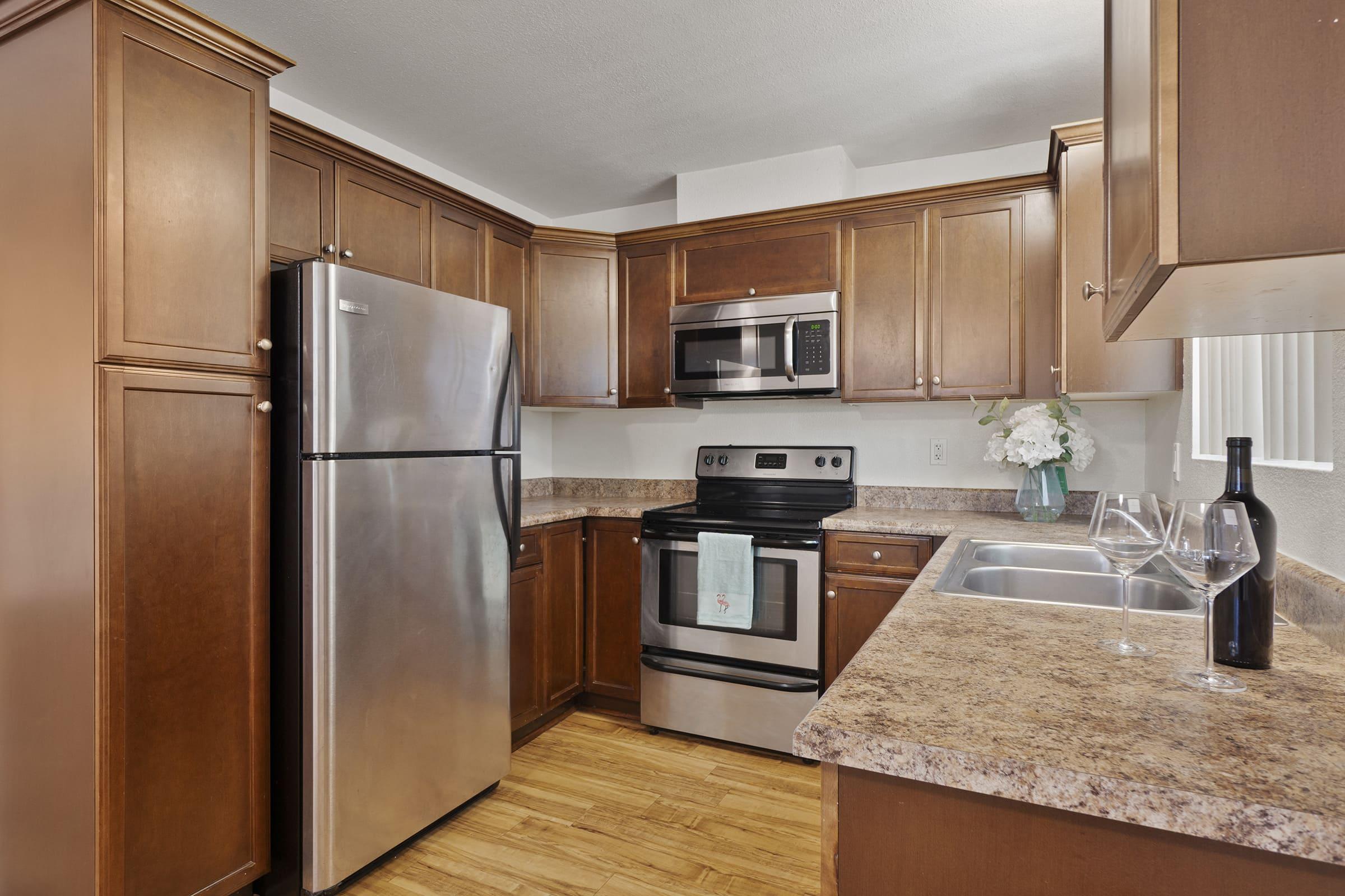 a stainless steel refrigerator in a kitchen