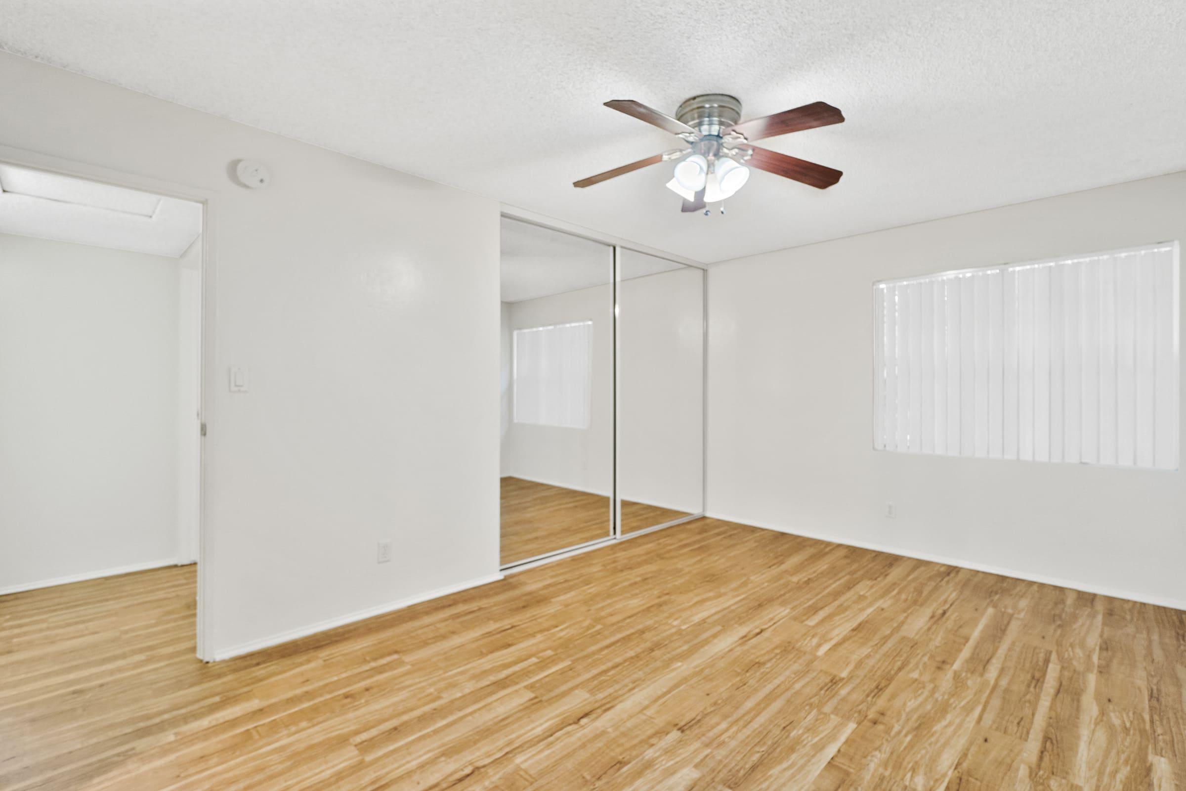 a kitchen with a wood floor